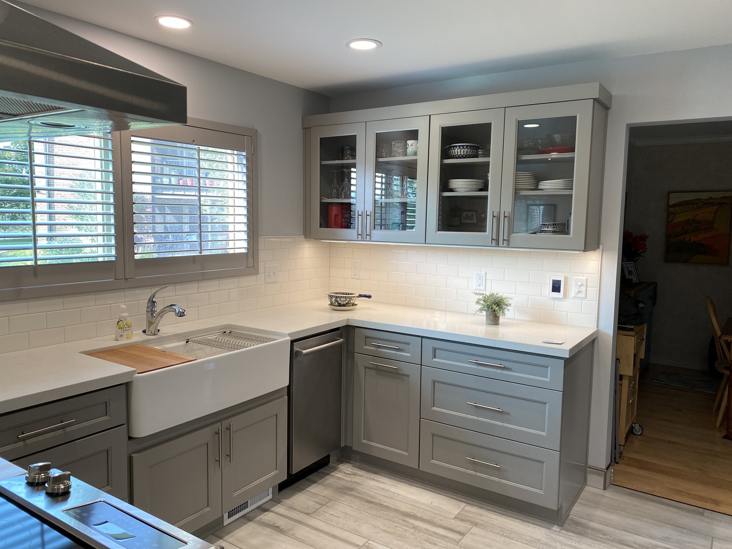 Modern kitchen remodel showcasing expert tile backsplash installation and high-end finishes by ANB Construction.