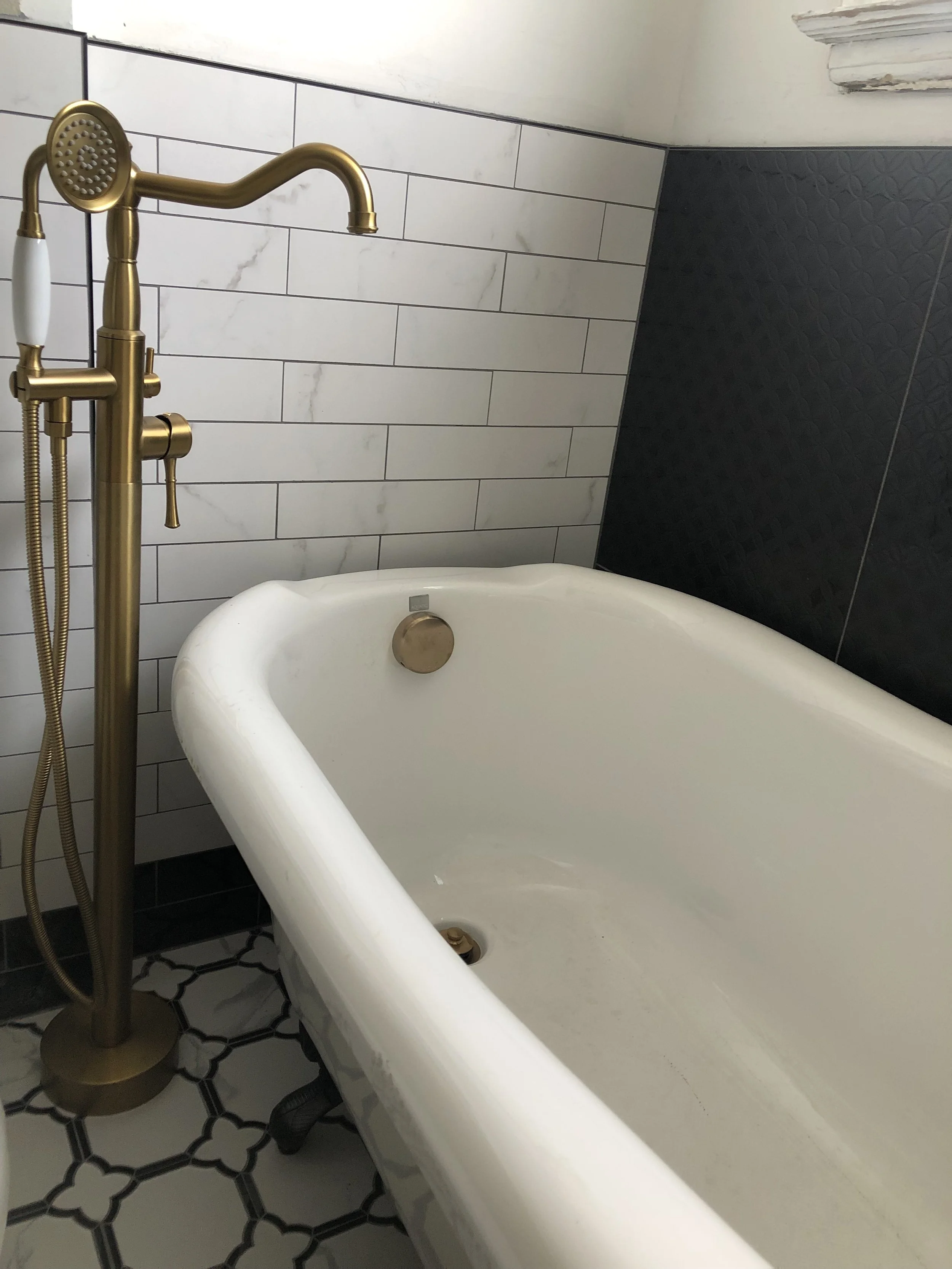 High-end bathroom makeover showcasing elegant design and flawless finish work by ANB Construction.