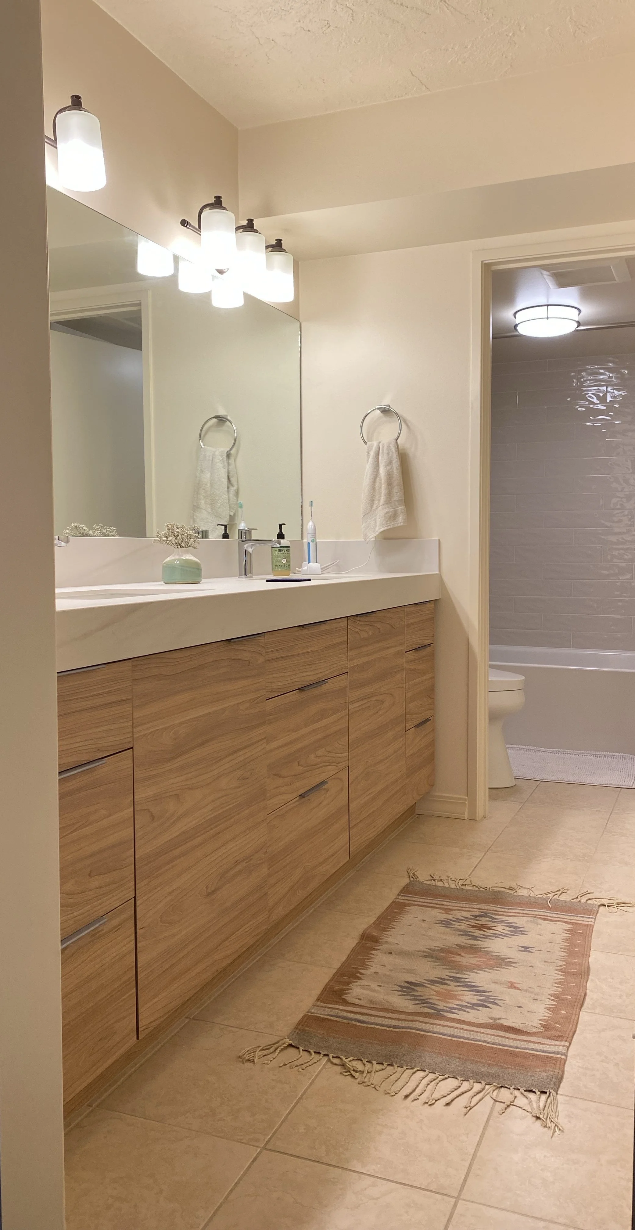 Premium bathroom renovation showcasing high-end finishes and custom space transformations by ANB Construction.