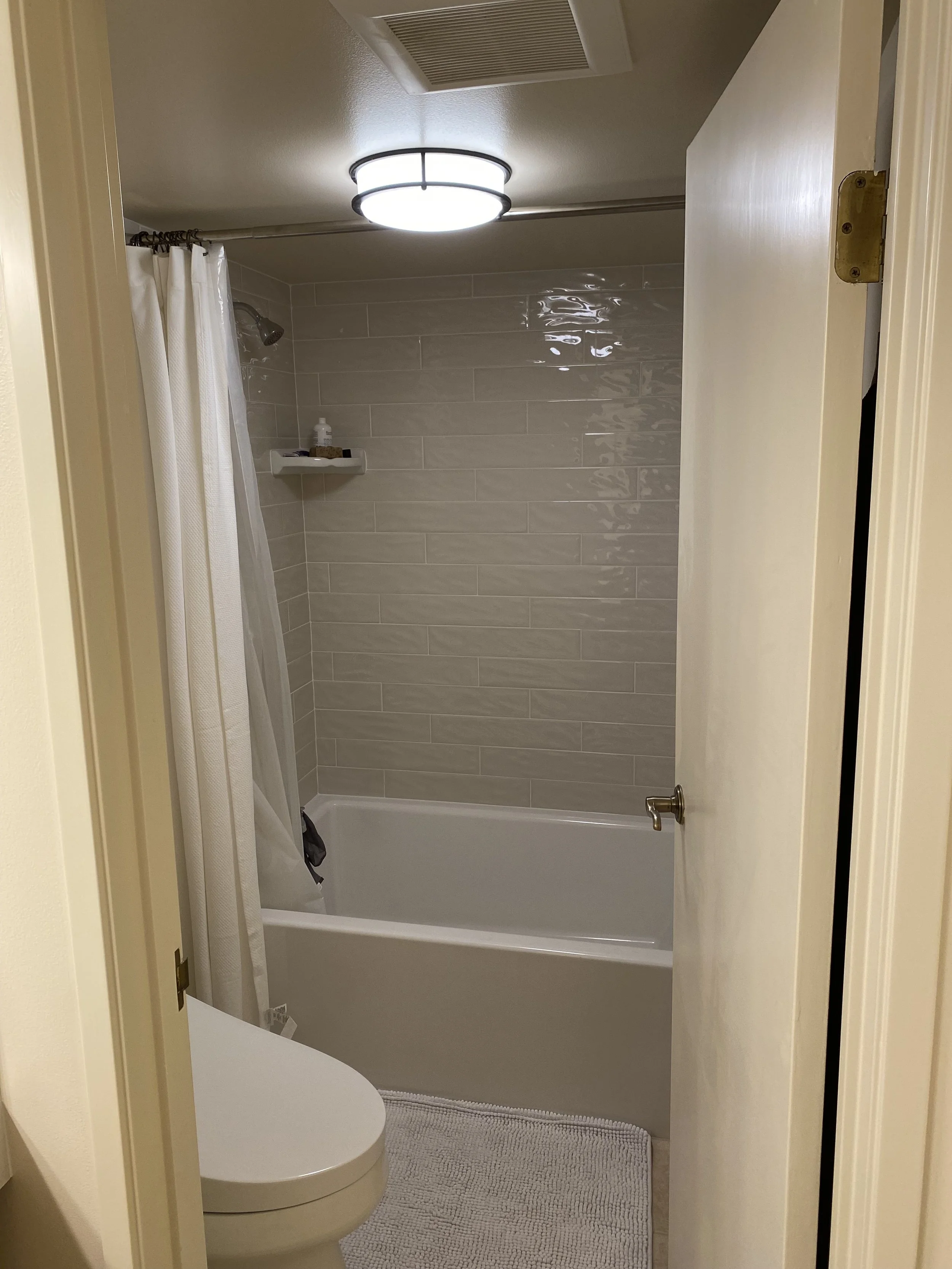 Premium bathroom renovation showcasing high-end finishes and custom space transformations by ANB Construction.