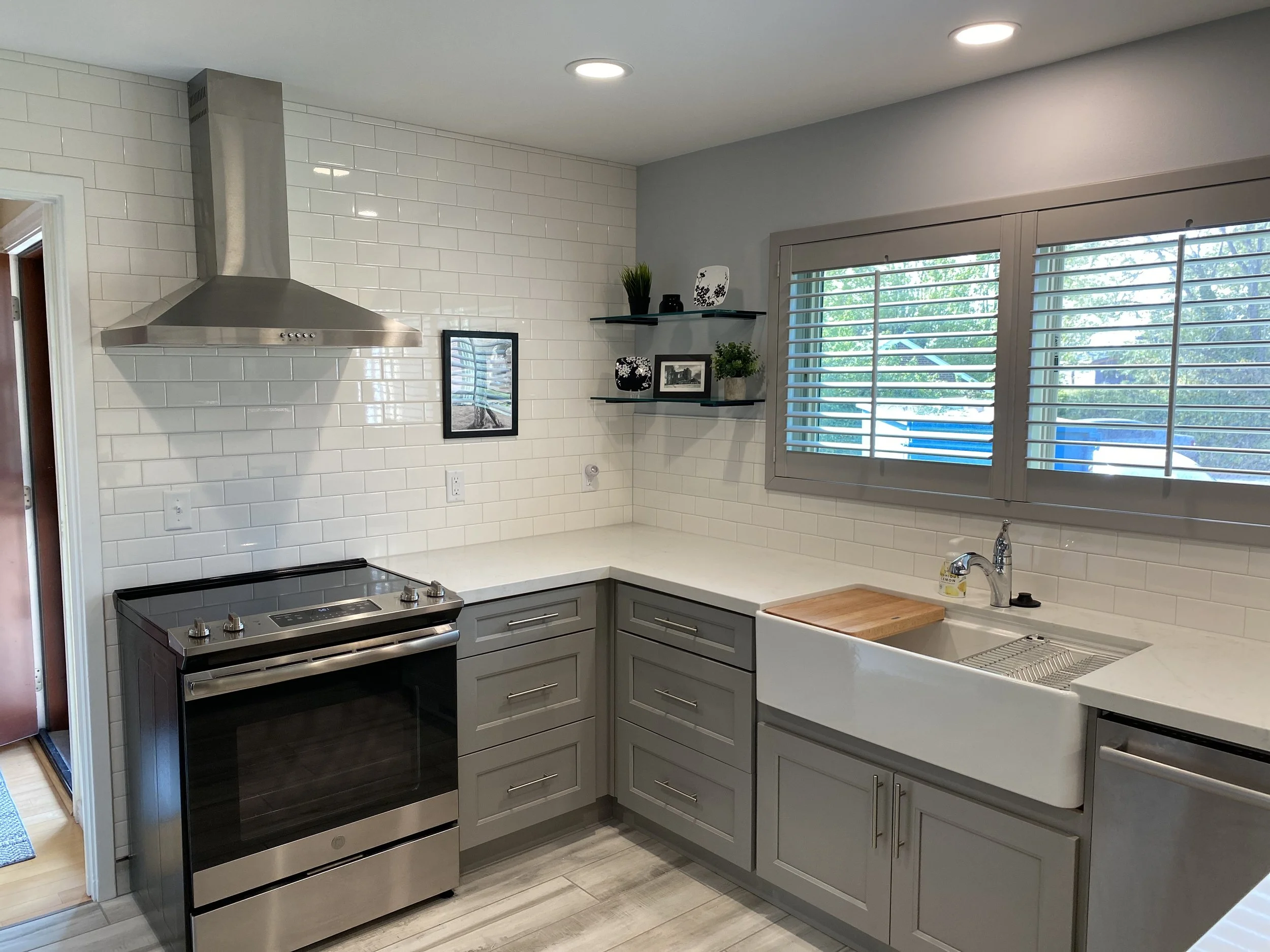 Modern kitchen remodel showcasing expert tile backsplash installation and high-end finishes by ANB Construction.