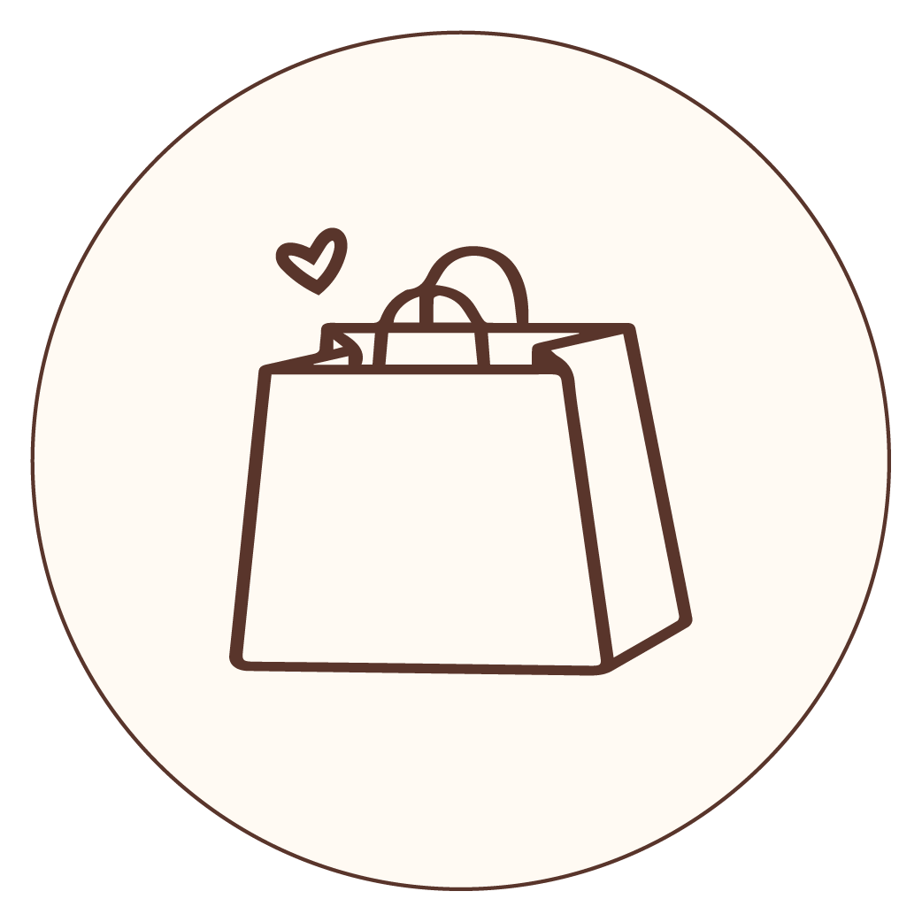 Line drawing of a shopping bag with handles, with a small heart symbol above it.