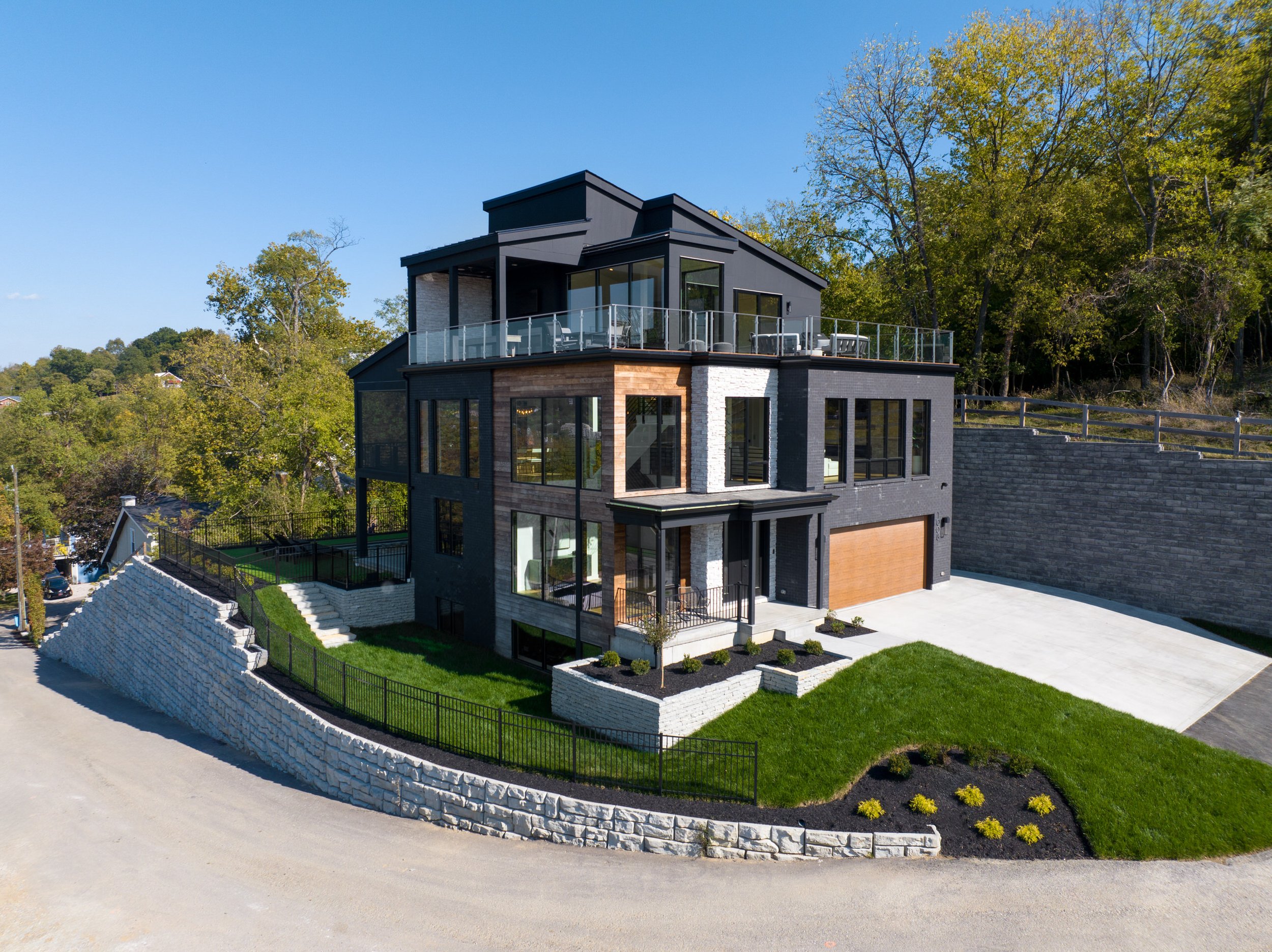 Contemporary home build with luxurious finishes and windows to provide sweeping views of the Cincinnati skyline