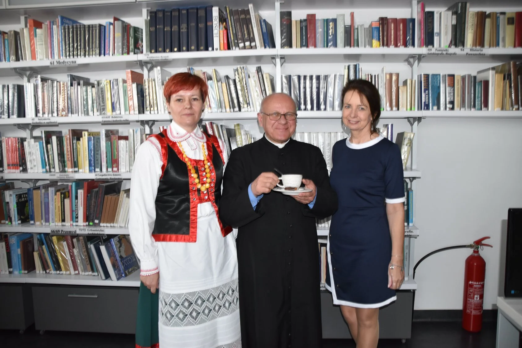 ~2019Poland.alek with priest.jpg.tmp.jpg