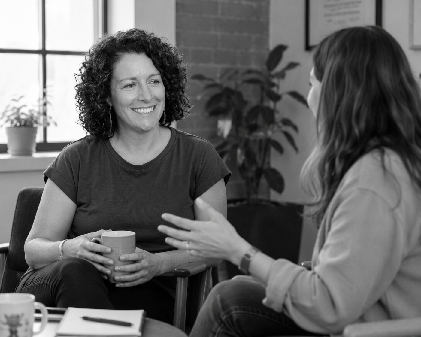 Tara Curry-Jahn in a one on one coaching conversation with a leader