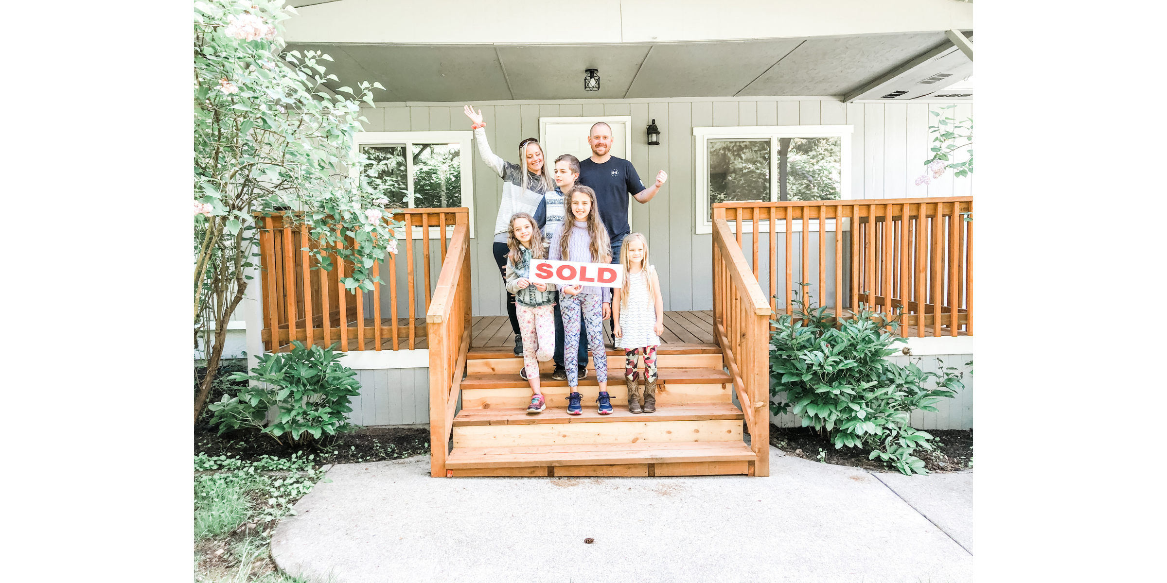 First-time homebuyers celebrating the purchase of an acreage property in Eatonville, Washington, with help from real estate broker Caitie Henselman.