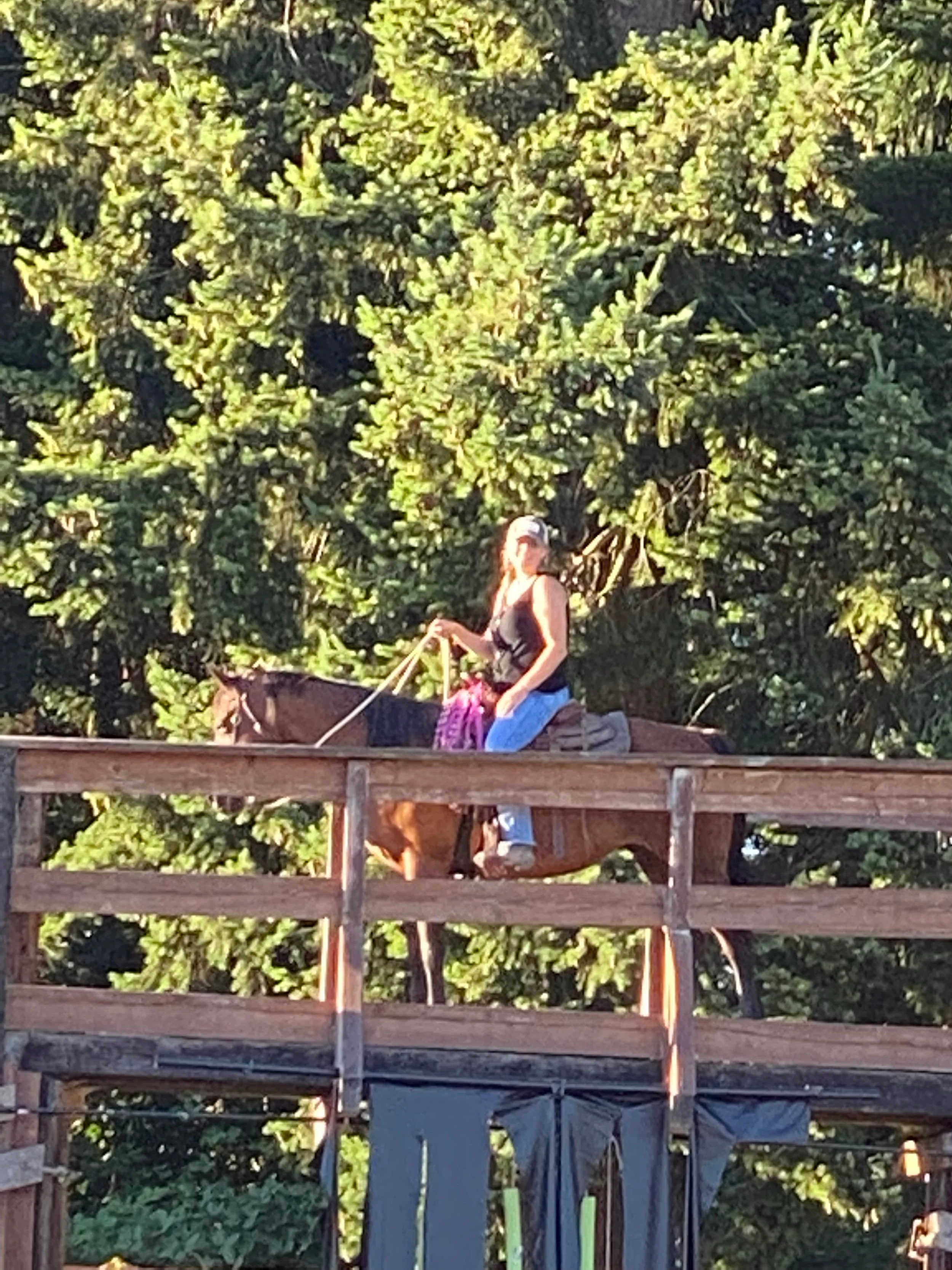 Caitie Henselman trail riding her horse Bella in Puyallup, Washington.