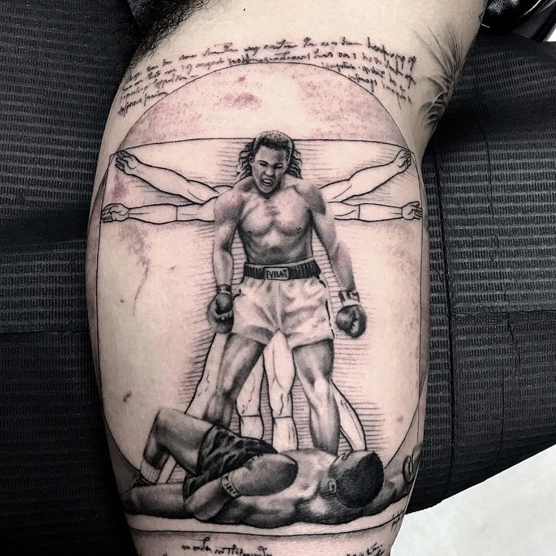 Black-and-gray boxer and Vitruvian Man tattoo by Luis Dajer in Charlotte, NC.