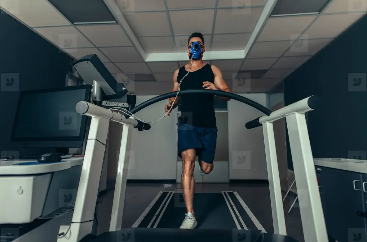 man running on a treadmille