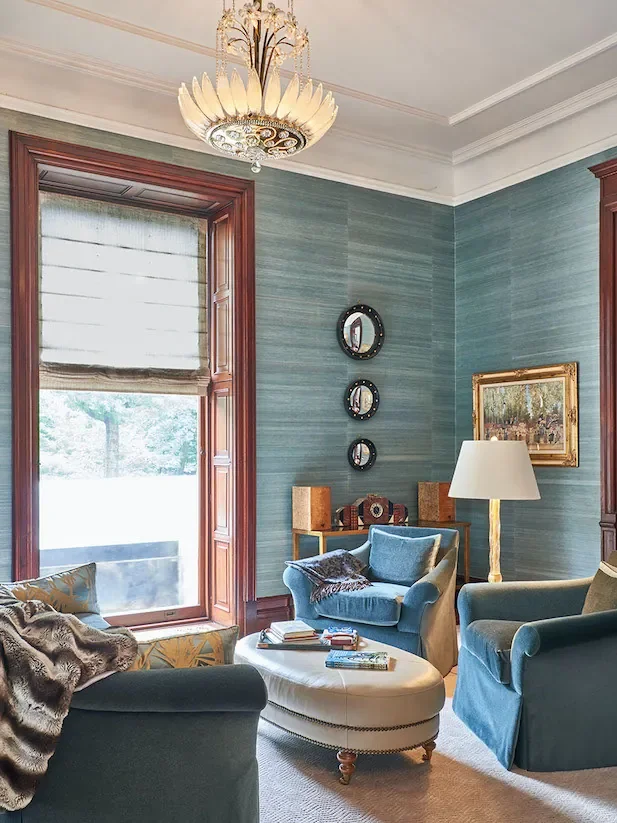 Grasscloth wallcovering installation in a luxury residential interior.