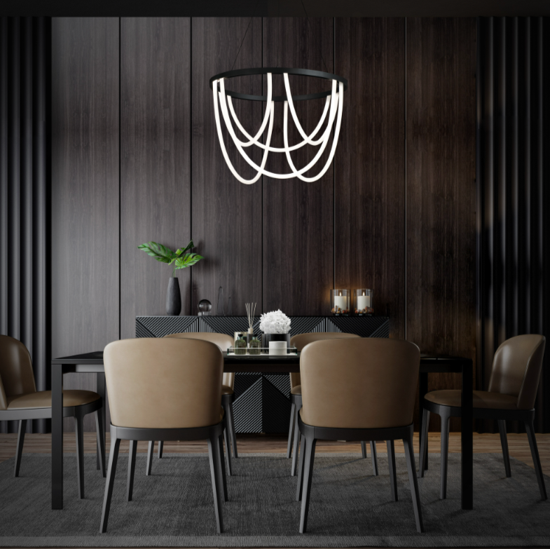 Modern dining room with a black table, six beige chairs, a dark wood accent wall, a decorative black sideboard, a tall green plant, candles, and a contemporary chandelier.