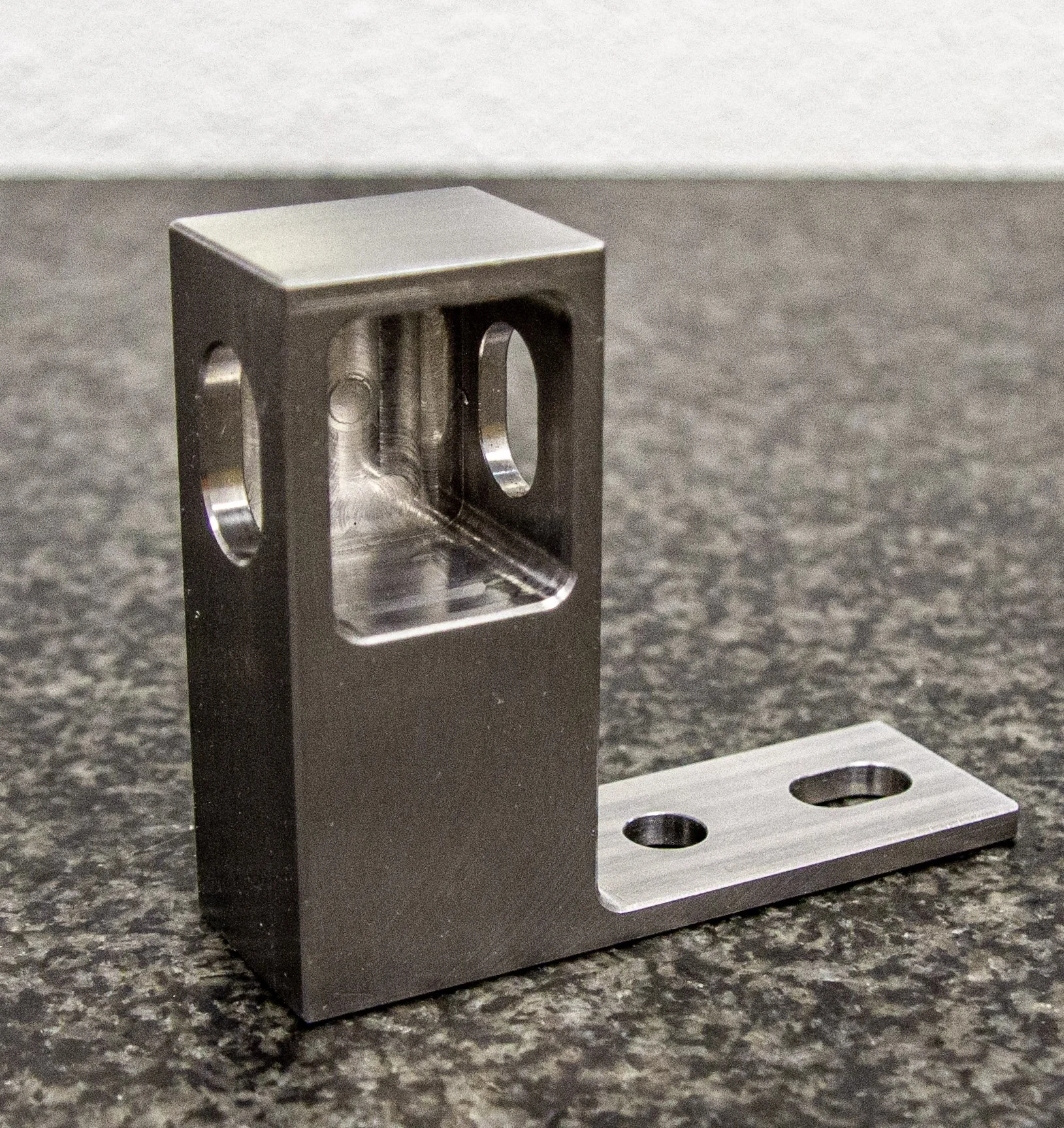 Precision CNC machining with coolant on high-tolerance aluminum component – 7C’s Manufacturing