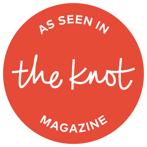 Red circular badge with white text that reads 'As Seen in the Knot Magazine,' with 'the knot' written in larger cursive font in the center.