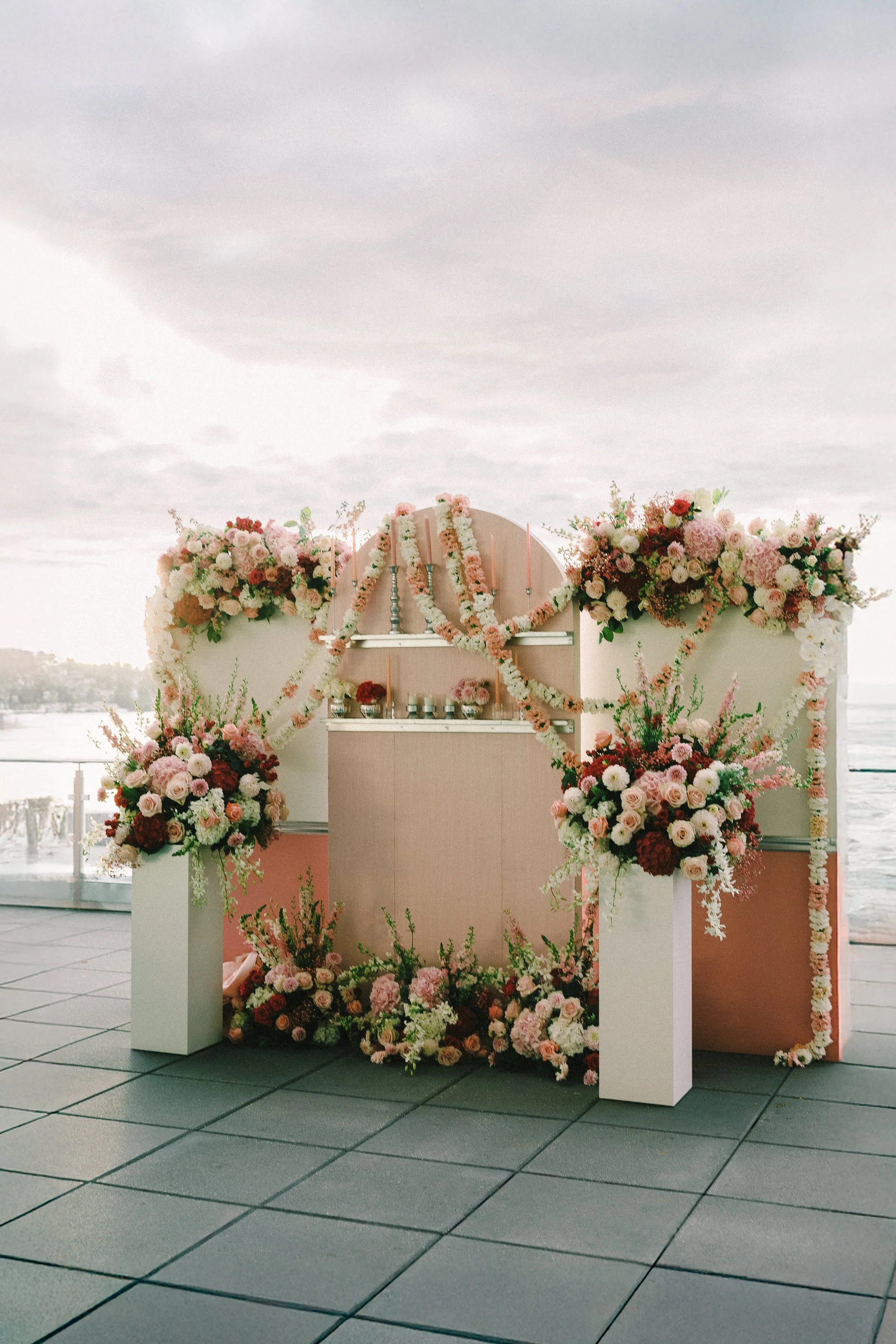 Floral arch Sangeet decor — Hyatt Regency Lake Washington Renton WA, Gordon Duo Weddings