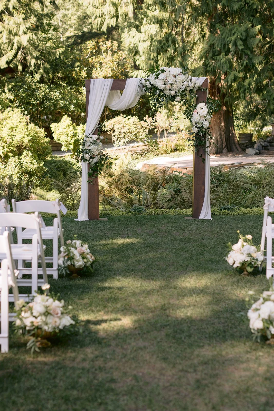 Wedding ceremony floral arch — Chateau Lill Woodinville Washington, Gordon Duo Weddings