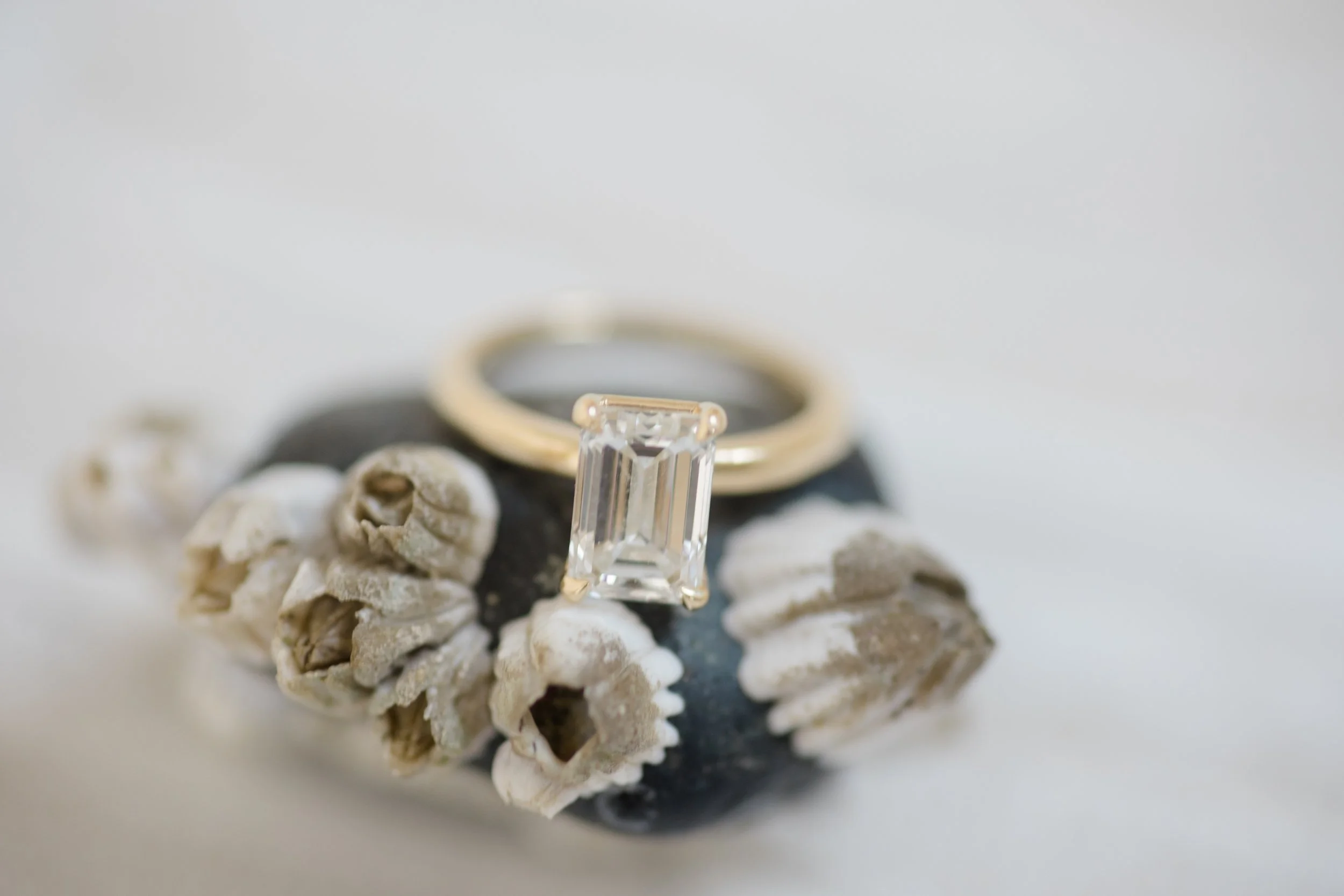 Wedding rings detail — Kate and Charlie's wedding at Kiana Lodge, planned by Gordon Duo Weddings