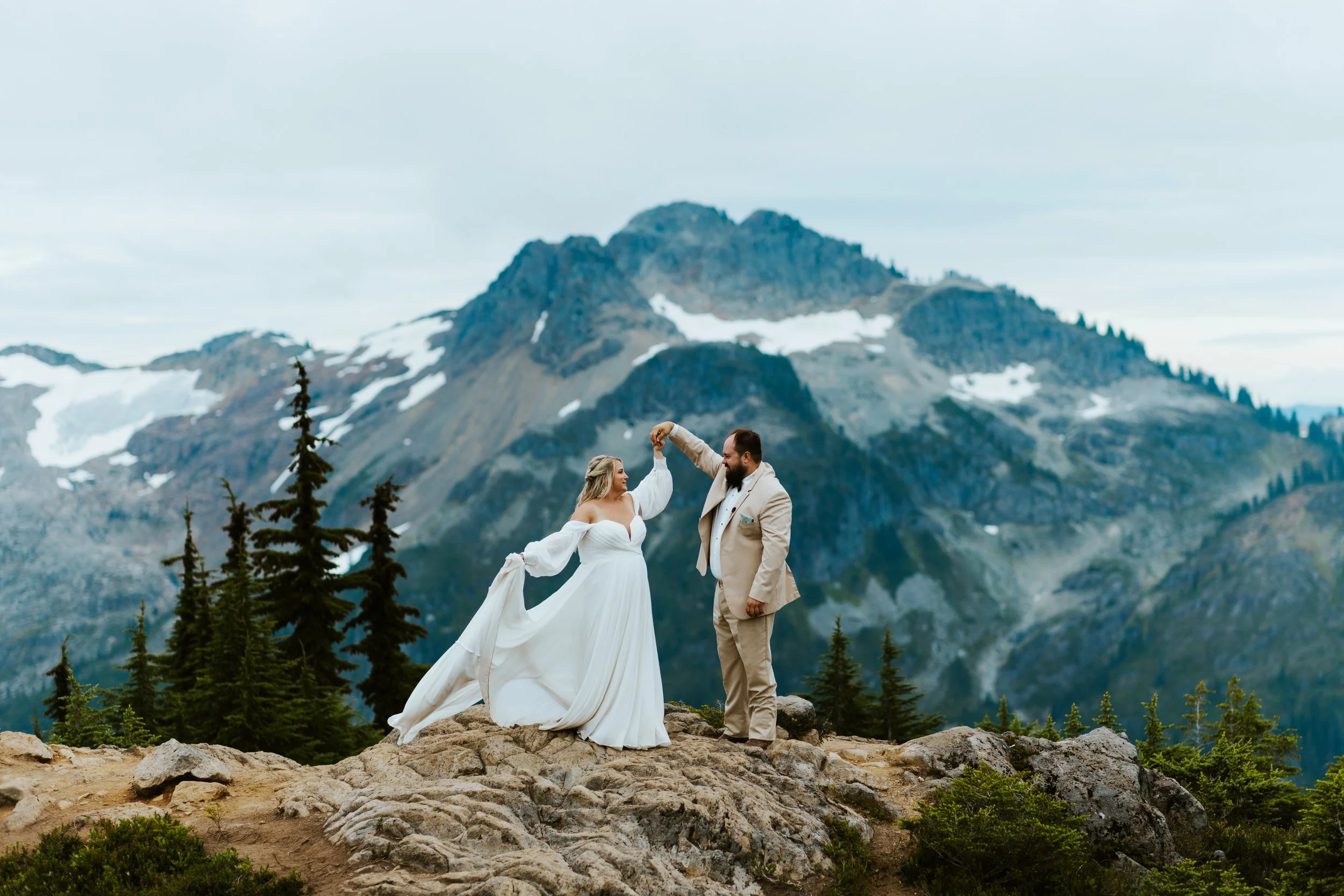 Couple celebrating their elopement in Mount Baker-Snoqualmie National Forest, WA — photo by Amanda Vaelynn Photography
