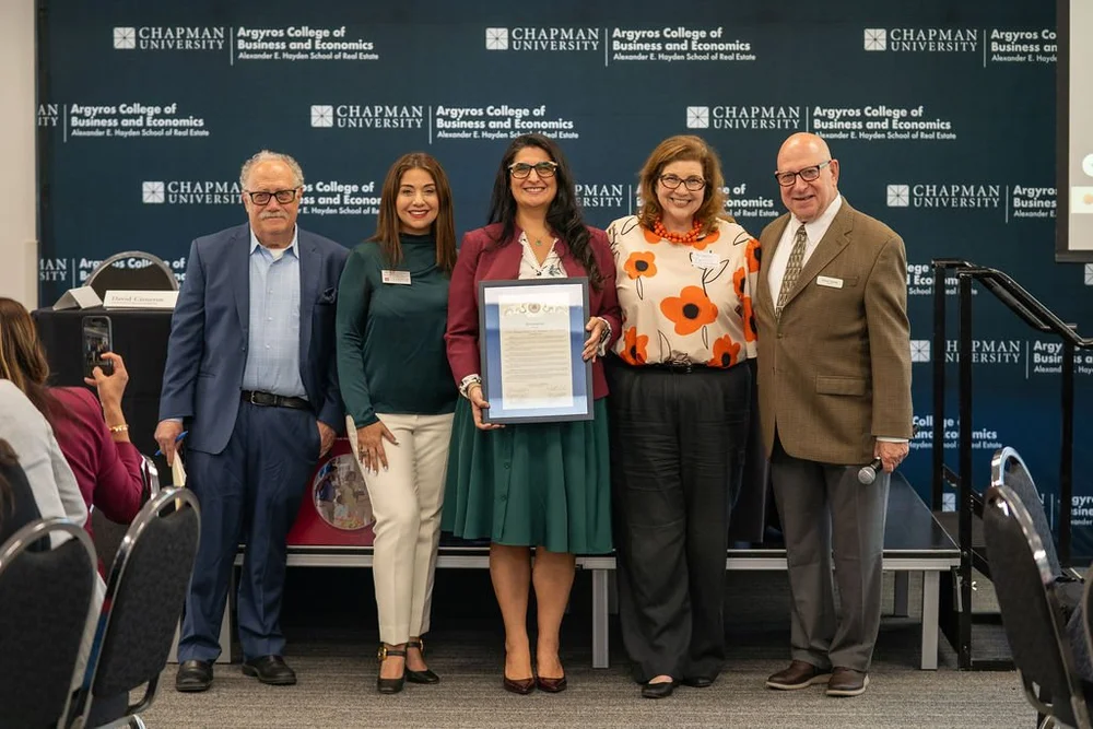 Center for Demographics and Policy team receiving a proclamation in recognition of National Homeownership Month