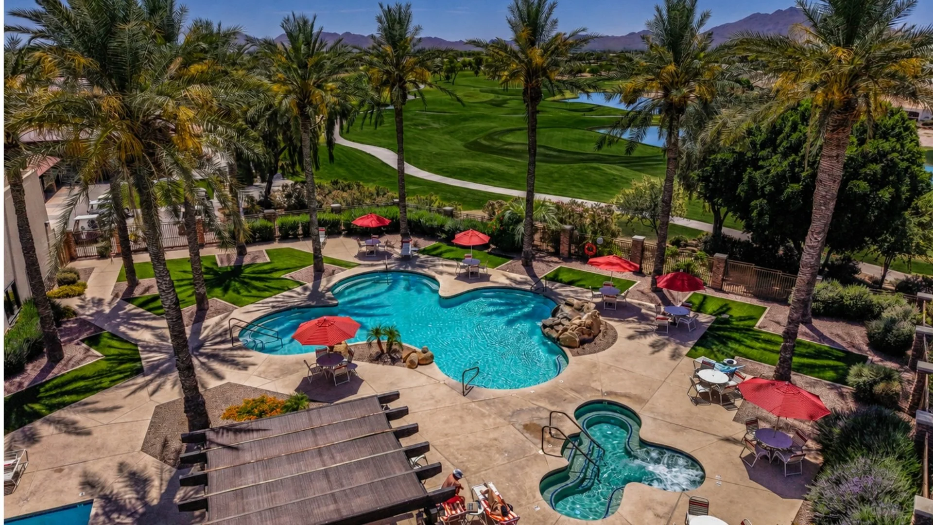 Resort-style swimming pool at Trilogy at Power Ranch, a 55+ active adult community in Gilbert, Arizona.