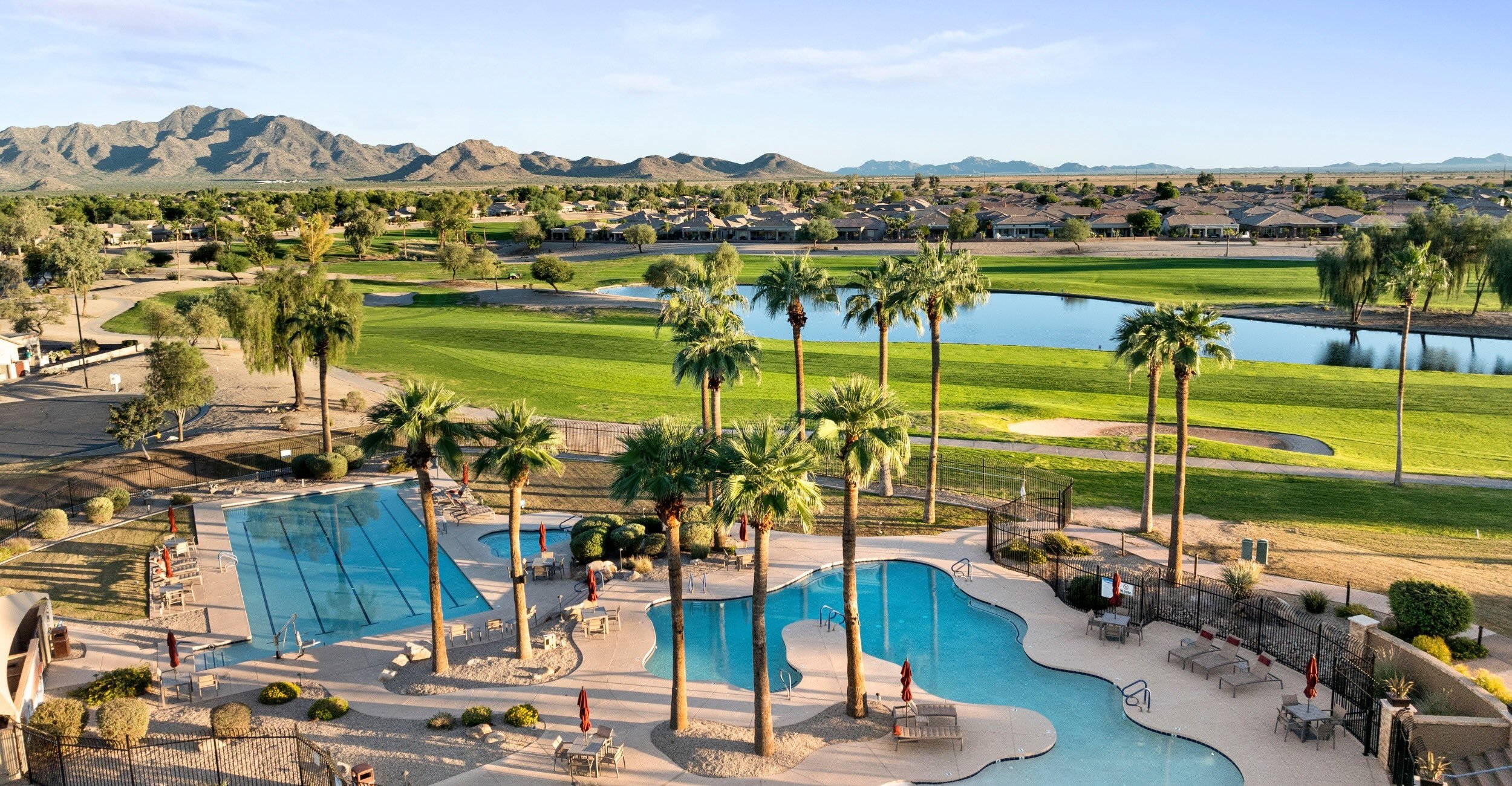 Resort pool at Solera Chandler with views of Lone Tree Golf Club and the San Tan Mountains.