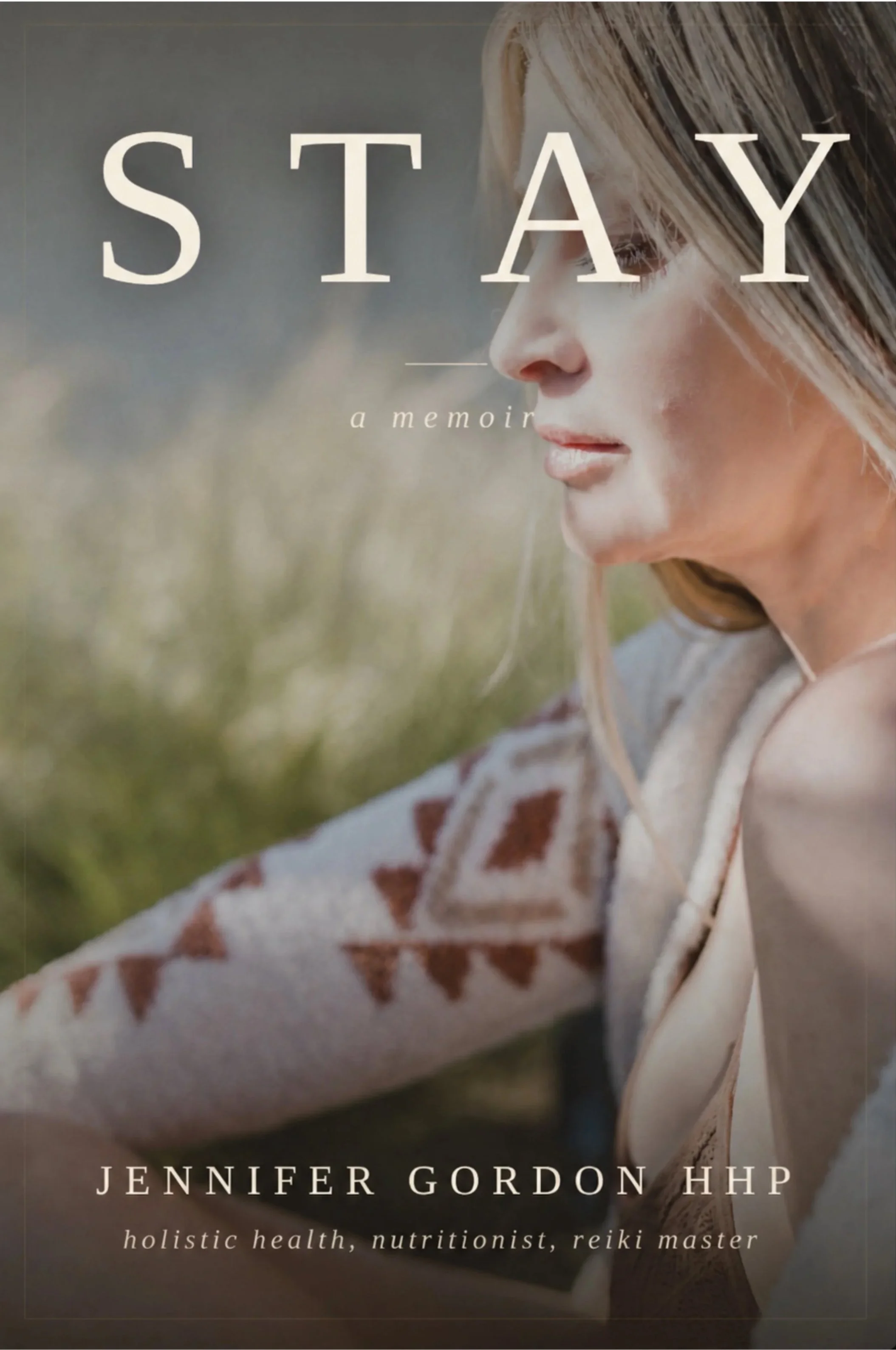 Cover of a book titled 'Stay: a memoir' by Jennifer Gordon HHP, with a profile of a woman with blonde hair, outdoors in natural lighting.
