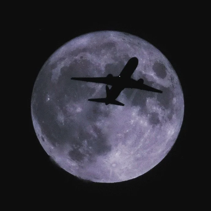 Jet passing the Moon