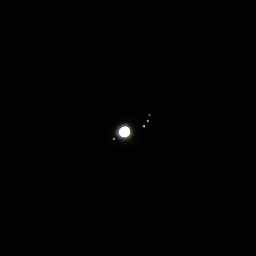 Jupiter and four moons