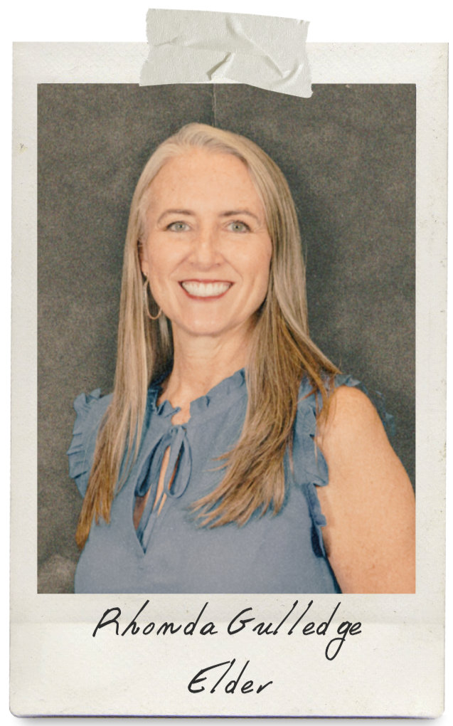 Woman smiling wearing blue shirt