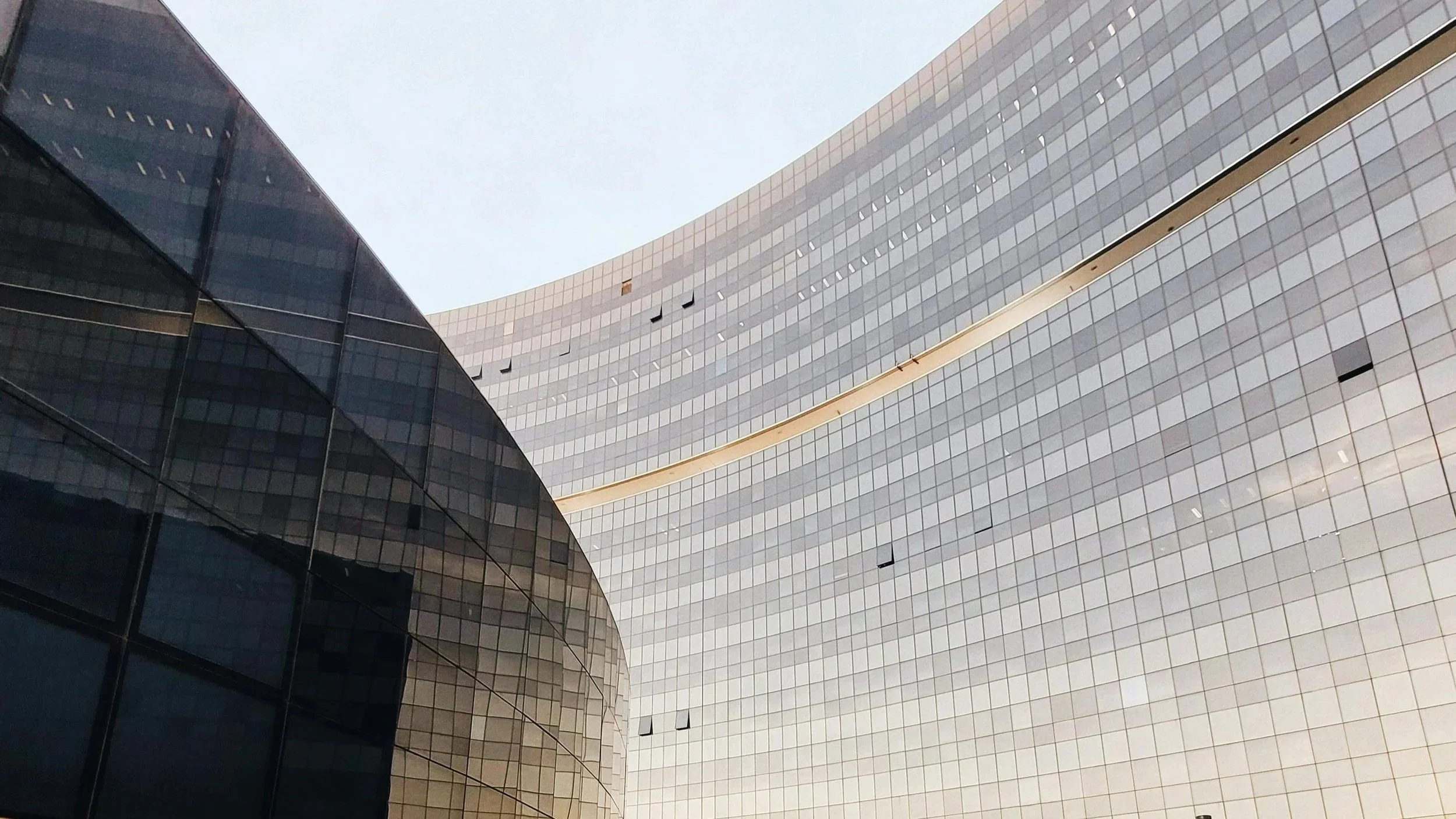 Photo of a modern office building with glass windows