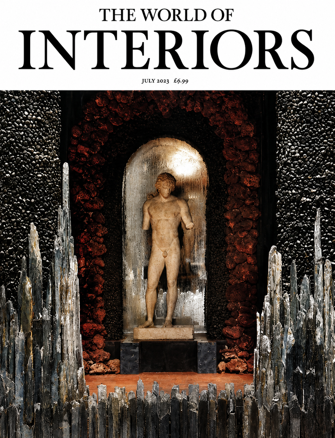Cover of The World of Interiors magazine July 2023 issue, featuring a classical sculpture of a nude male figure in a decorative setting with black and red rocks, water fountains, and dark textured walls.
