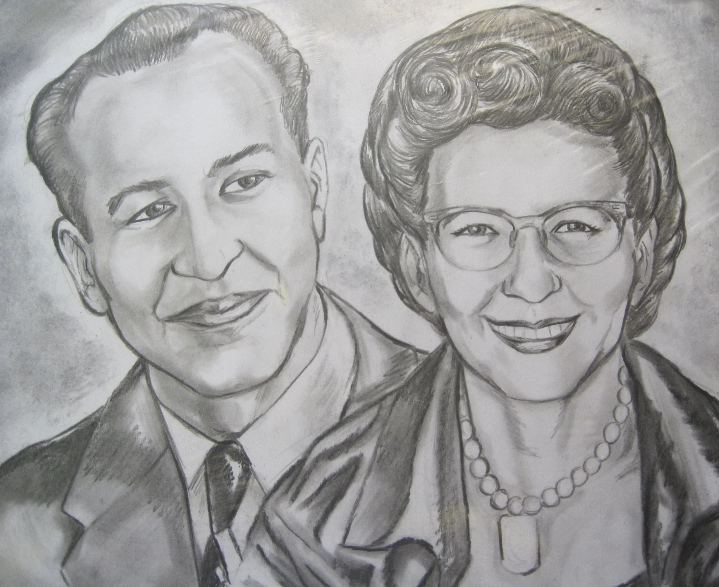 A black and white pencil sketch of two women, one older with glasses and a pearl necklace, and one younger with earrings, smiling.