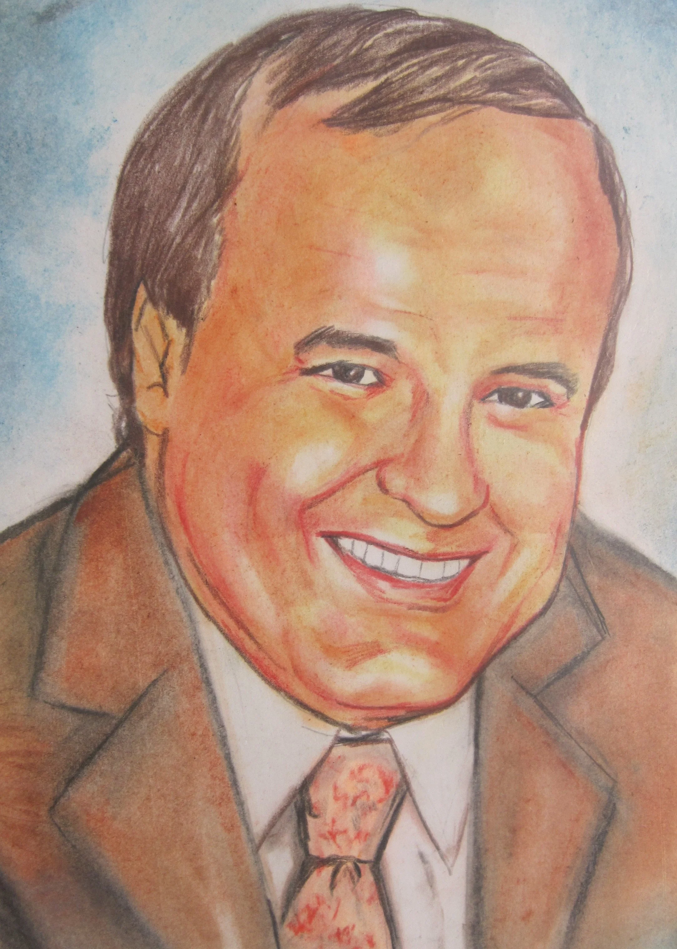 A colored pencil drawing of a man with dark hair, smiling, wearing a gray suit and tie.