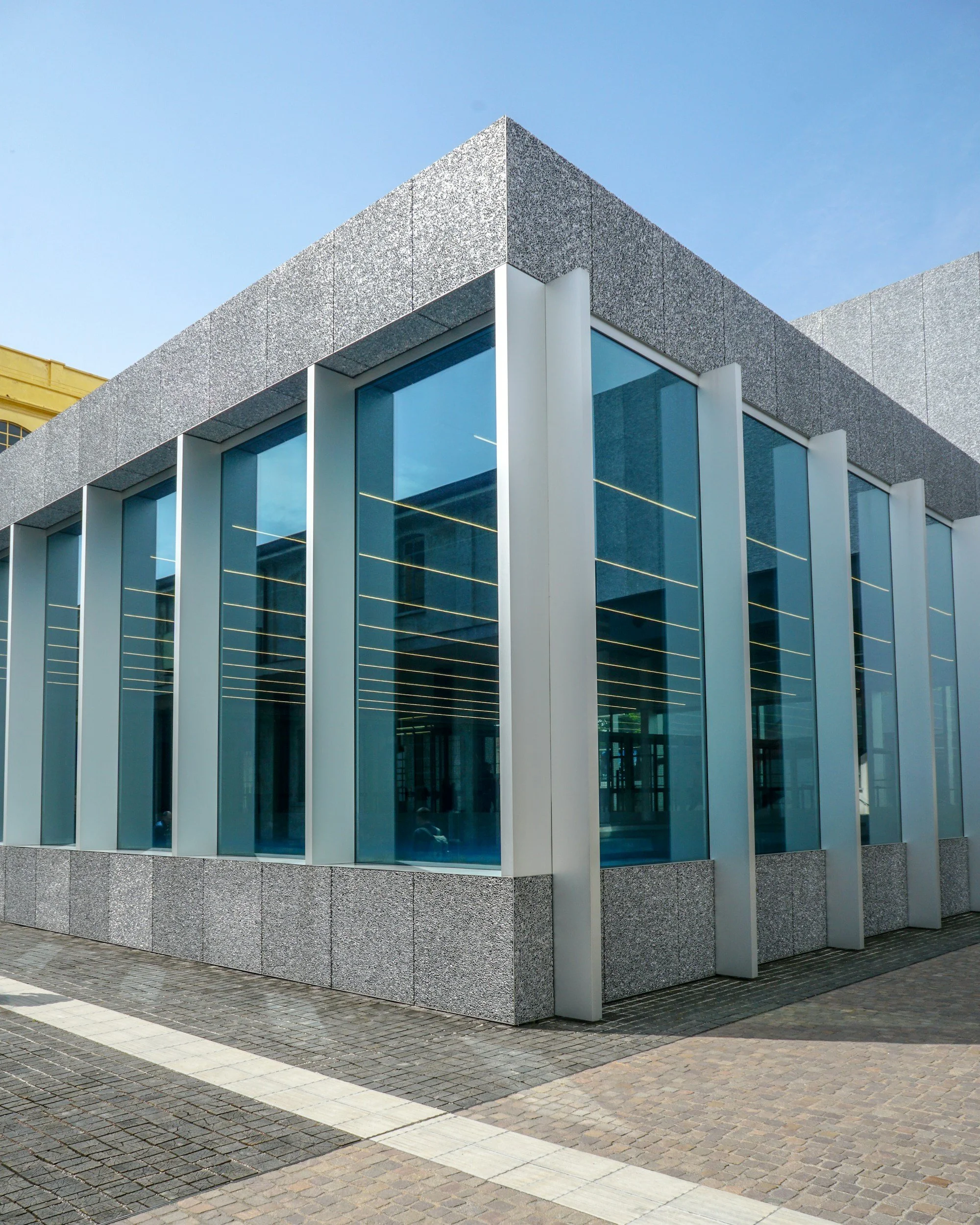 Modern commercial glass installation featuring office glass walls, storefront windows, glass doors, and contemporary architectural glass systems for business spaces.