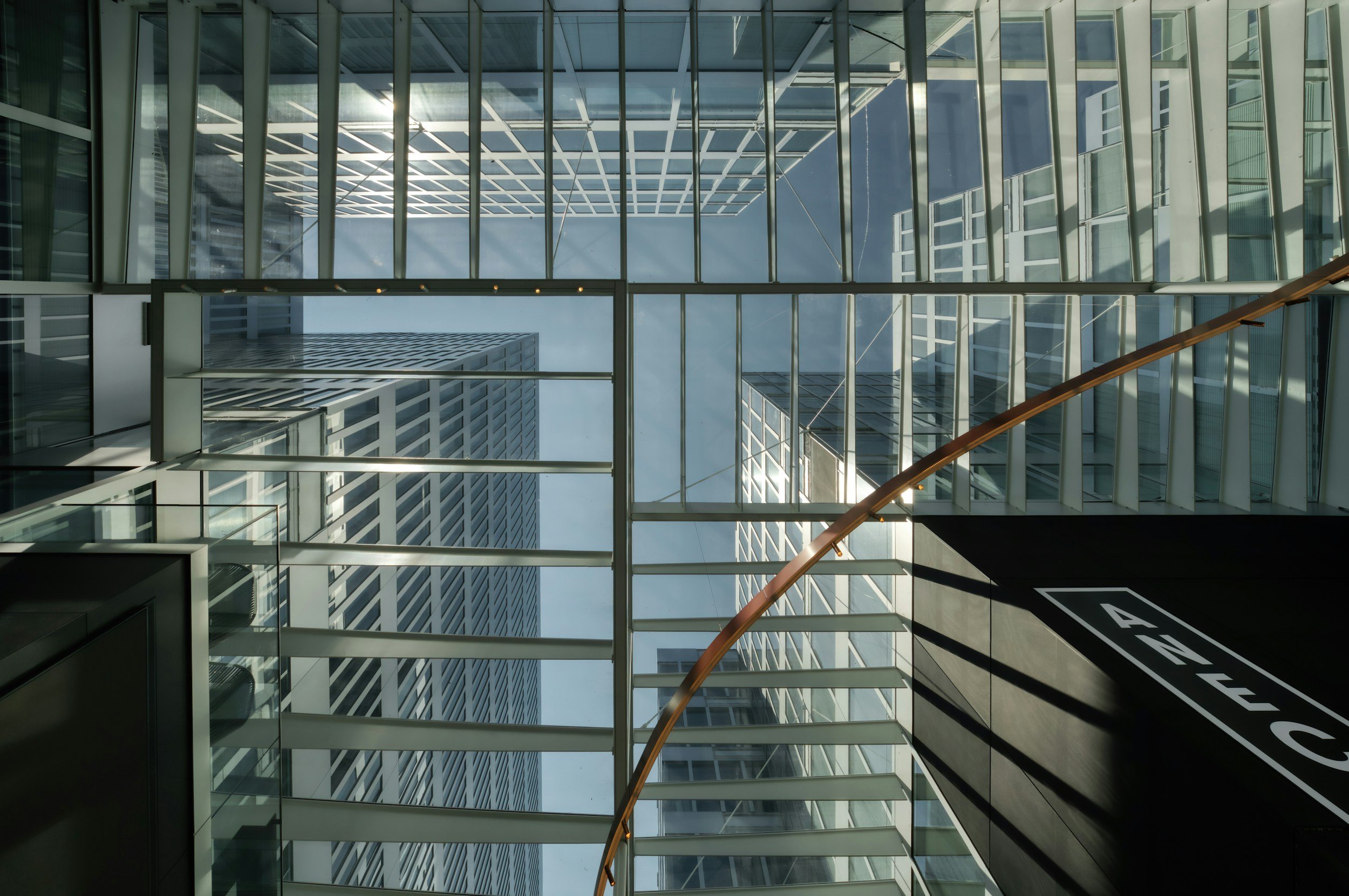 Modern storefront and office glass installation featuring commercial glass walls, office partitions, large display windows, and contemporary architectural glass design for business spaces.
