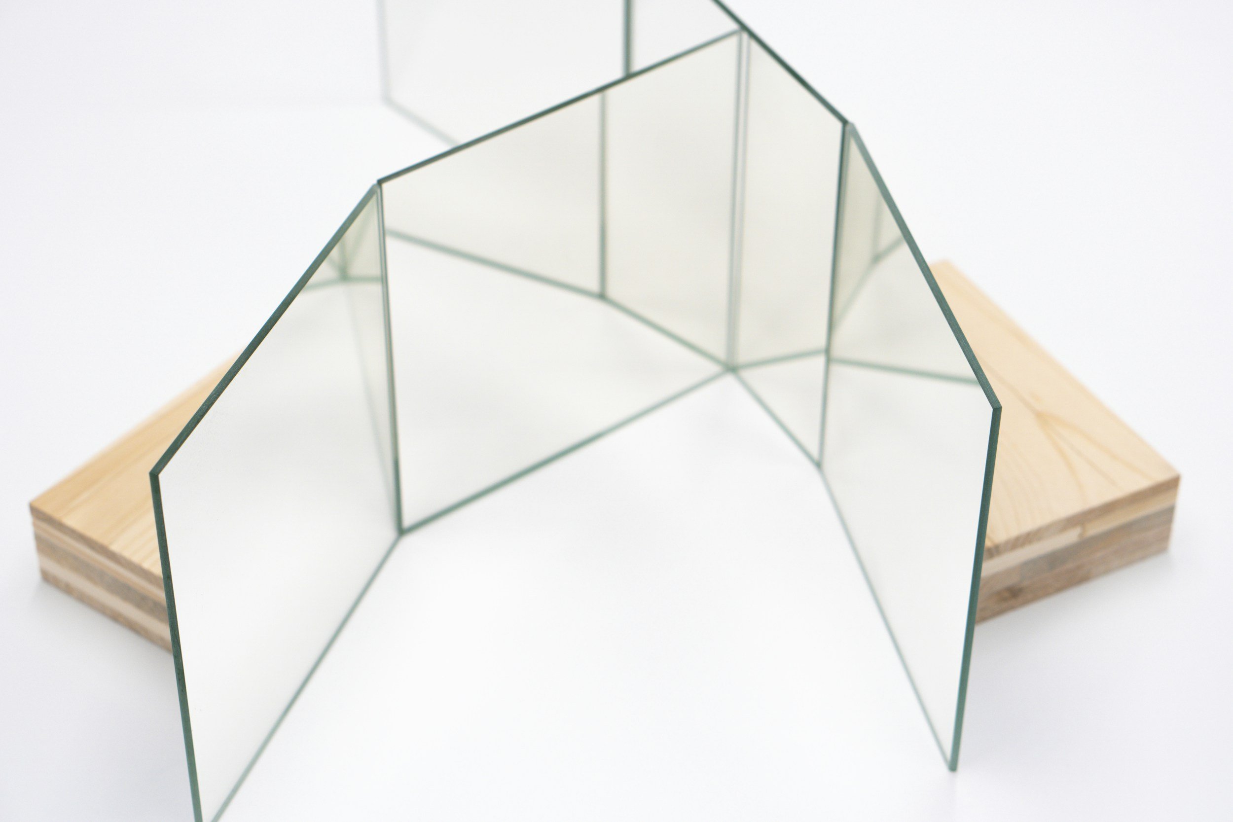 Custom fabricated glass panels featuring precision craftsmanship, modern architectural glass design, and tailored residential and commercial glass solutions.