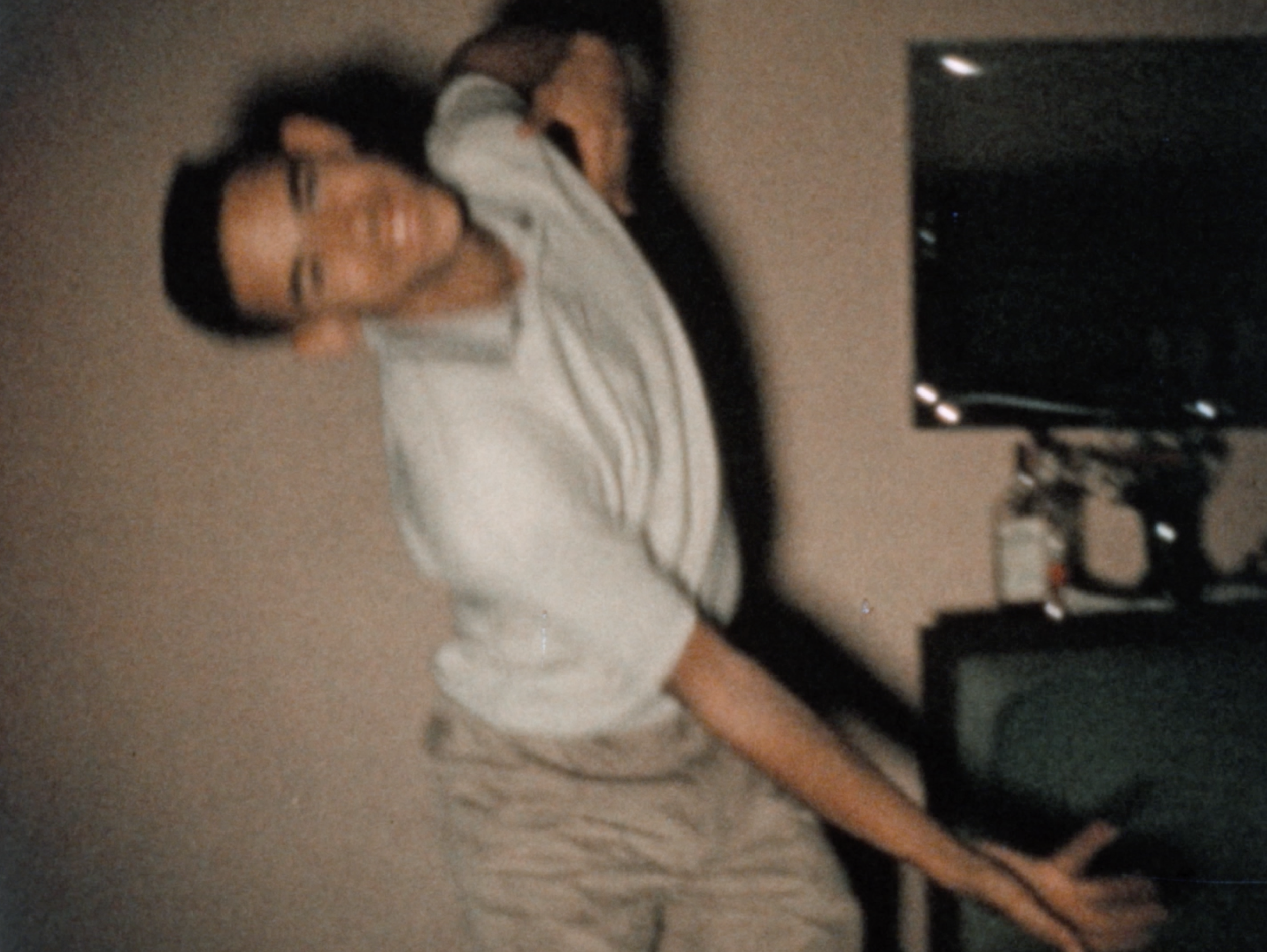 "ALMOND STREET," single channel video projected on glitter paint, 2023