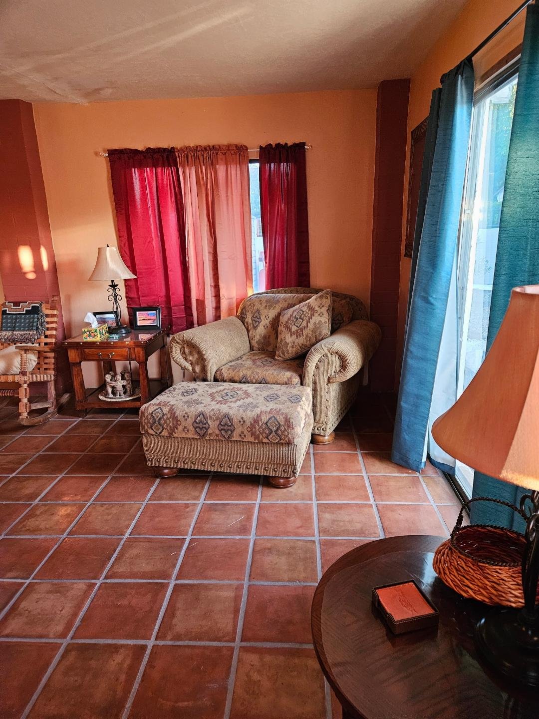 Arizona Room/Sunroom Sitting Area

Bright Corner for Relaxation
Filled with natural light, this cozy sunroom seating area is the perfect place to enjoy a morning coffee, read a book, or simply relax. Comfortable furnishings and warm Southwestern colo