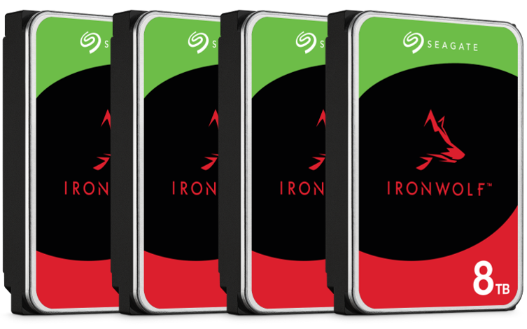 Four Seagate Ironwolf 8TB hard drives with black and red labels, arranged side by side.