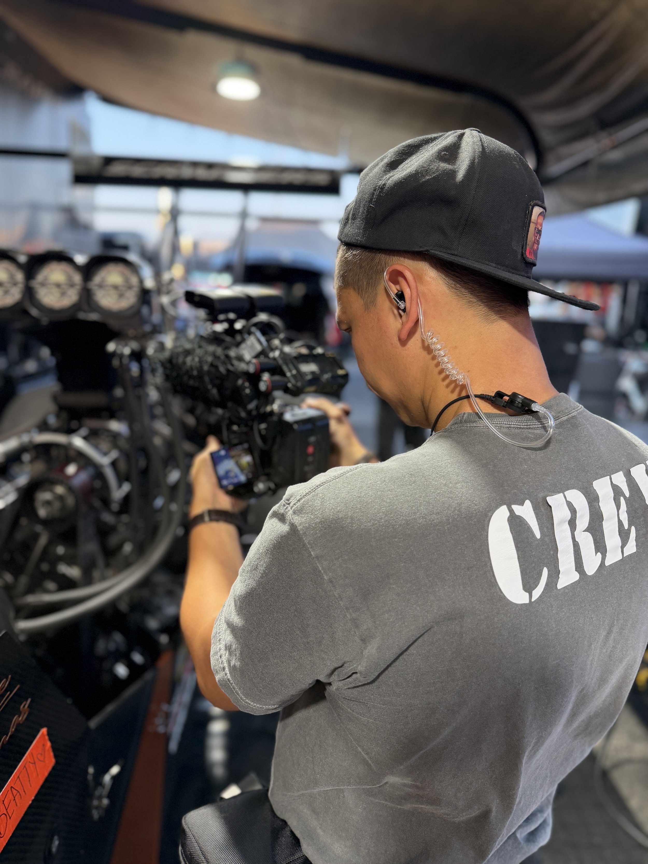 BTS of The Mr. Machine Show. Behind-the-Scenes of The Mr. Machine Show with Tay Whiteside. Drag Racing for kids. The Mr. Machine Show at the NHRA Charlotte 4-Wide Drag Race.