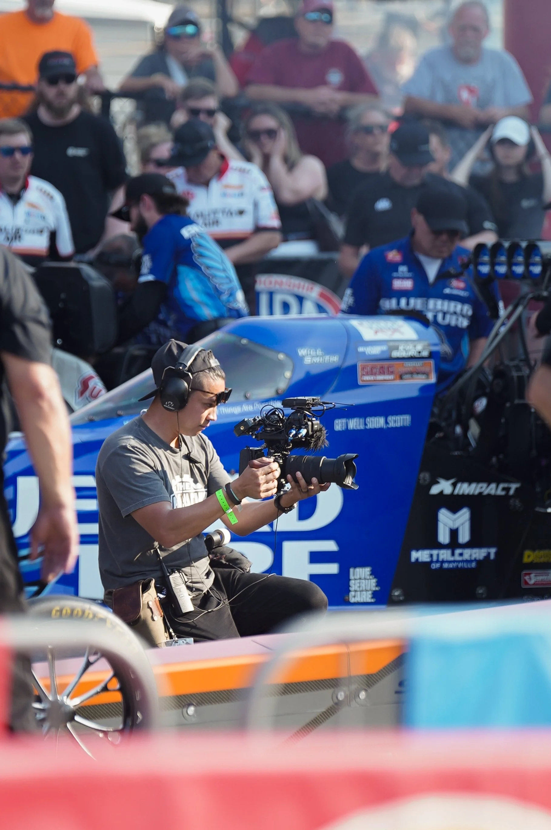 BTS of The Mr. Machine Show. Behind-the-Scenes of The Mr. Machine Show with Tay Whiteside. Zach Boyd filming for The Mr. Machine Show at the NHRA Charlotte 4-Wide Drag Race. 
