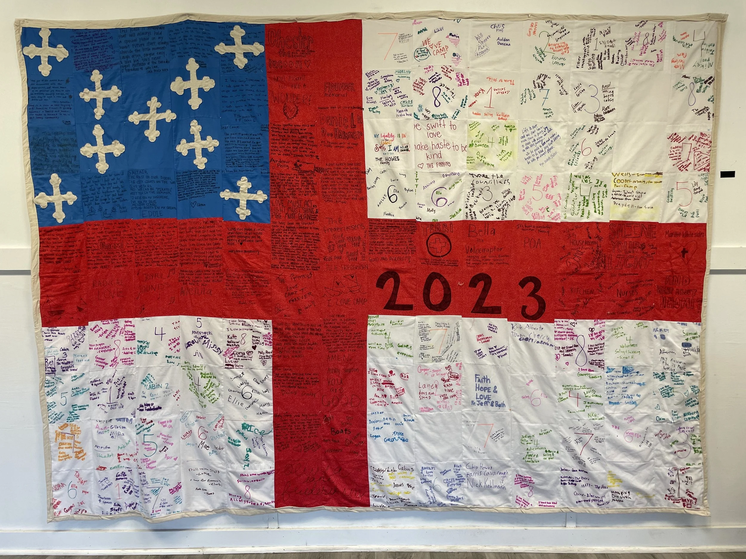 Camp Trinity Episcopal flag quilt signed by every camper and staff member of summer 2023