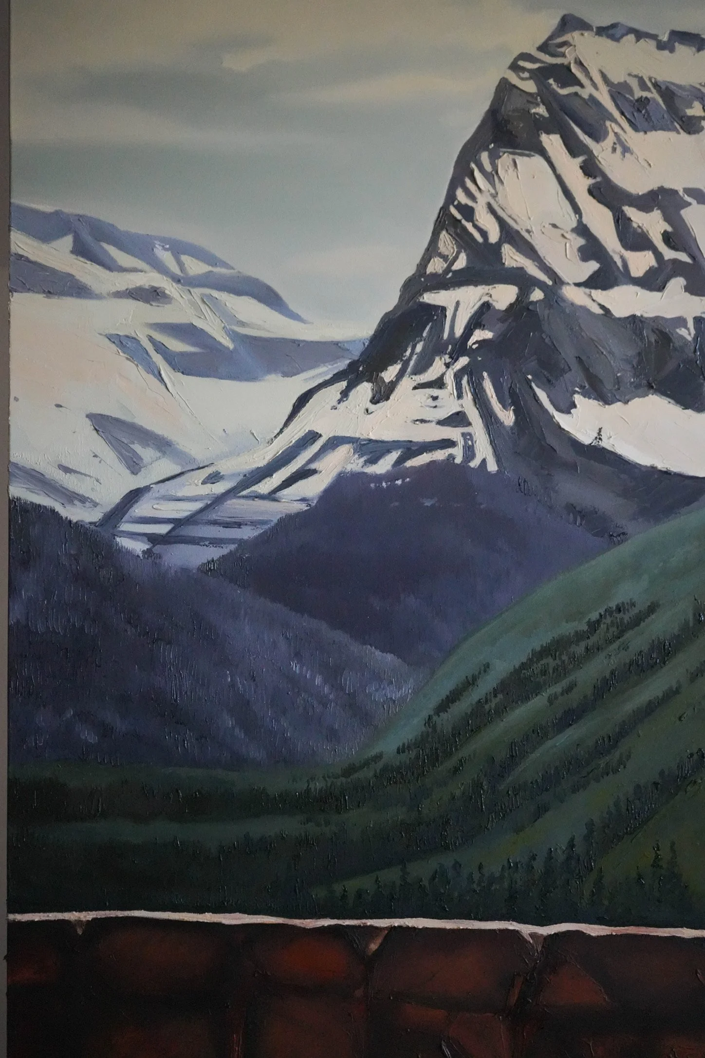 Painted landscape of snow-covered mountains with a grassy foreground, using shades of blue, white, and green.