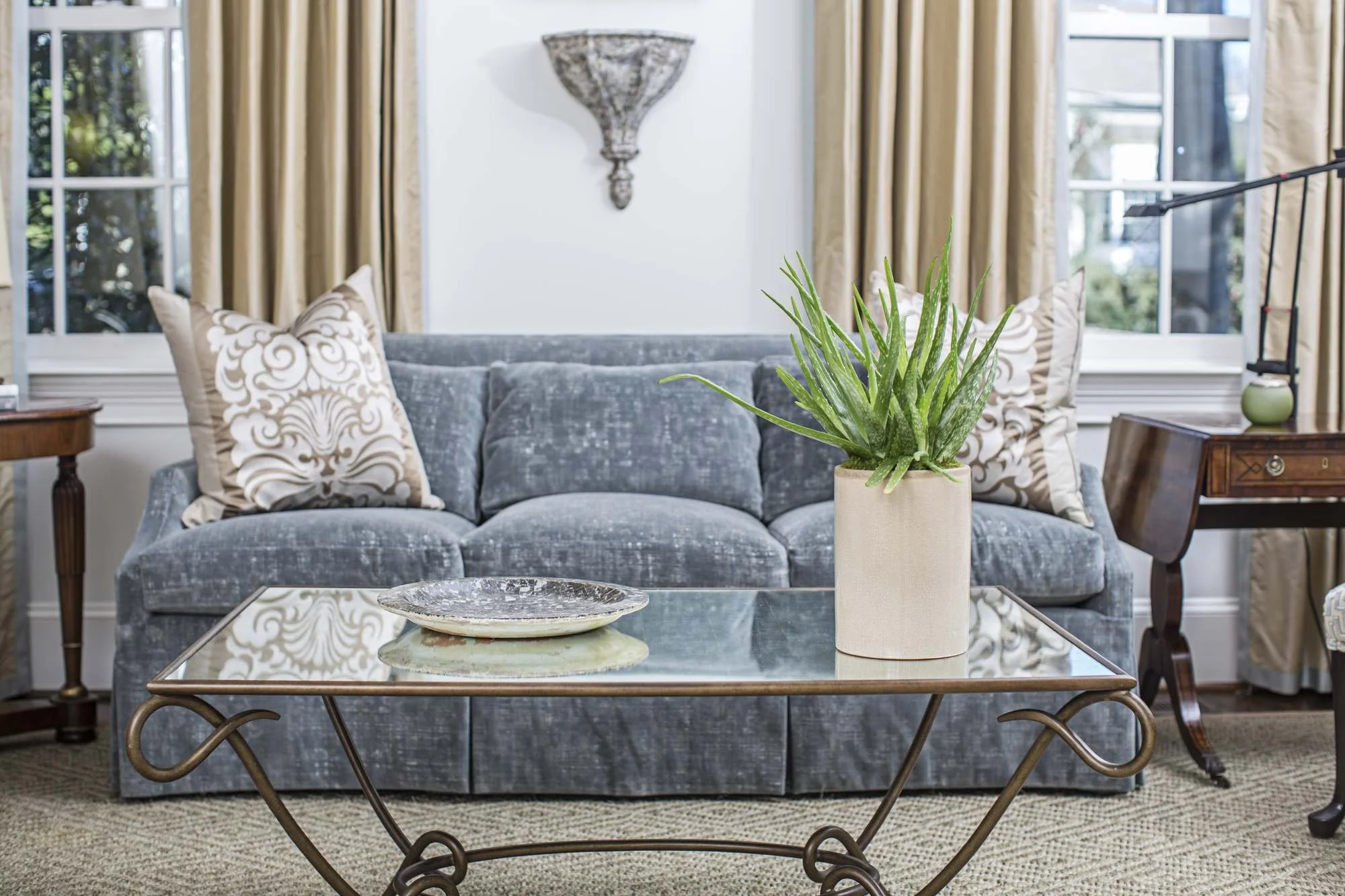 cofield-atlanta-residential-interior-design-living-room-velvet-sofa-glass-coffee-table-detail.jpg