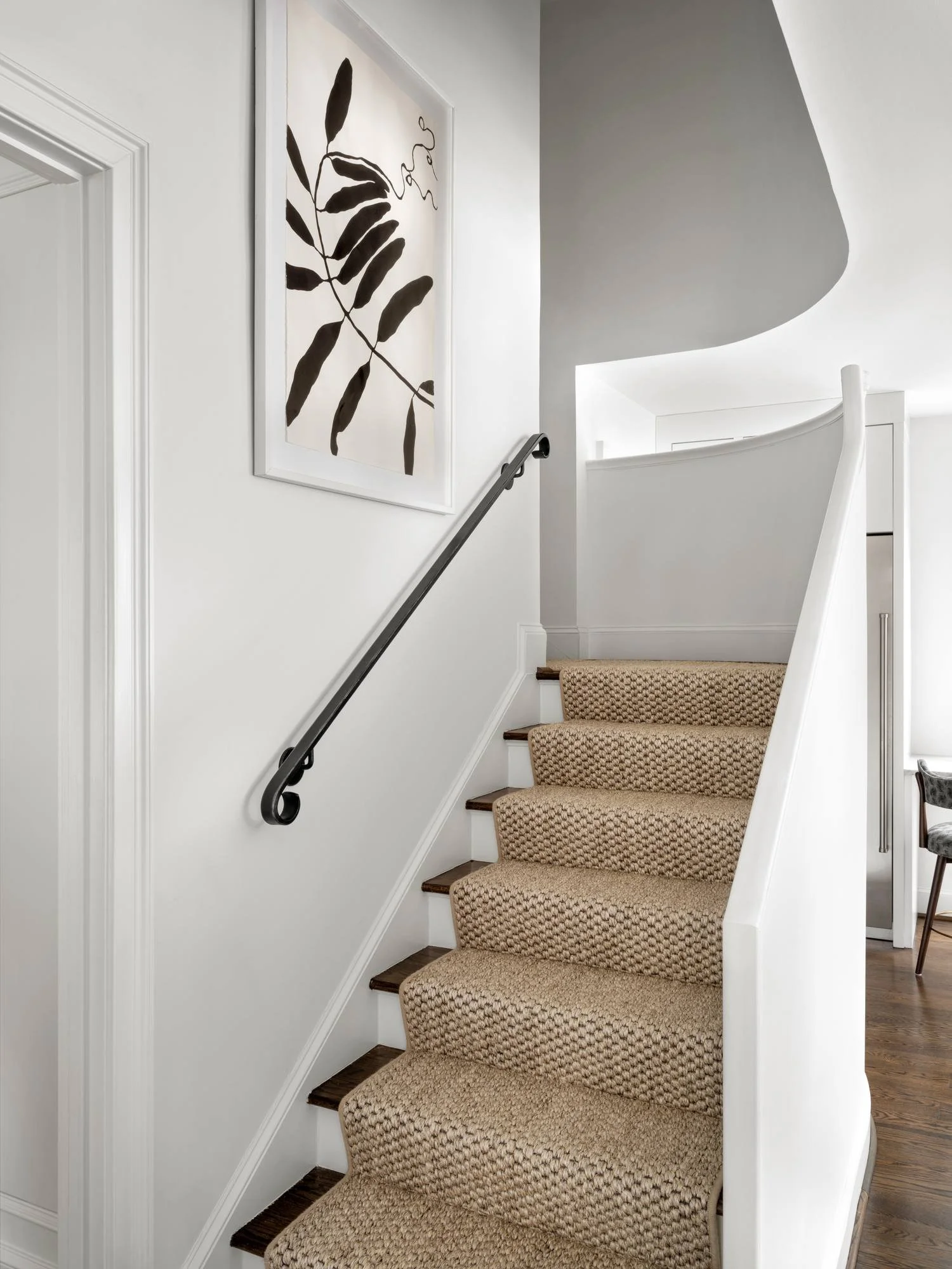 Peachtree-Battle-staircase-sisal-runner-iron-rail-botanical-art.jpg