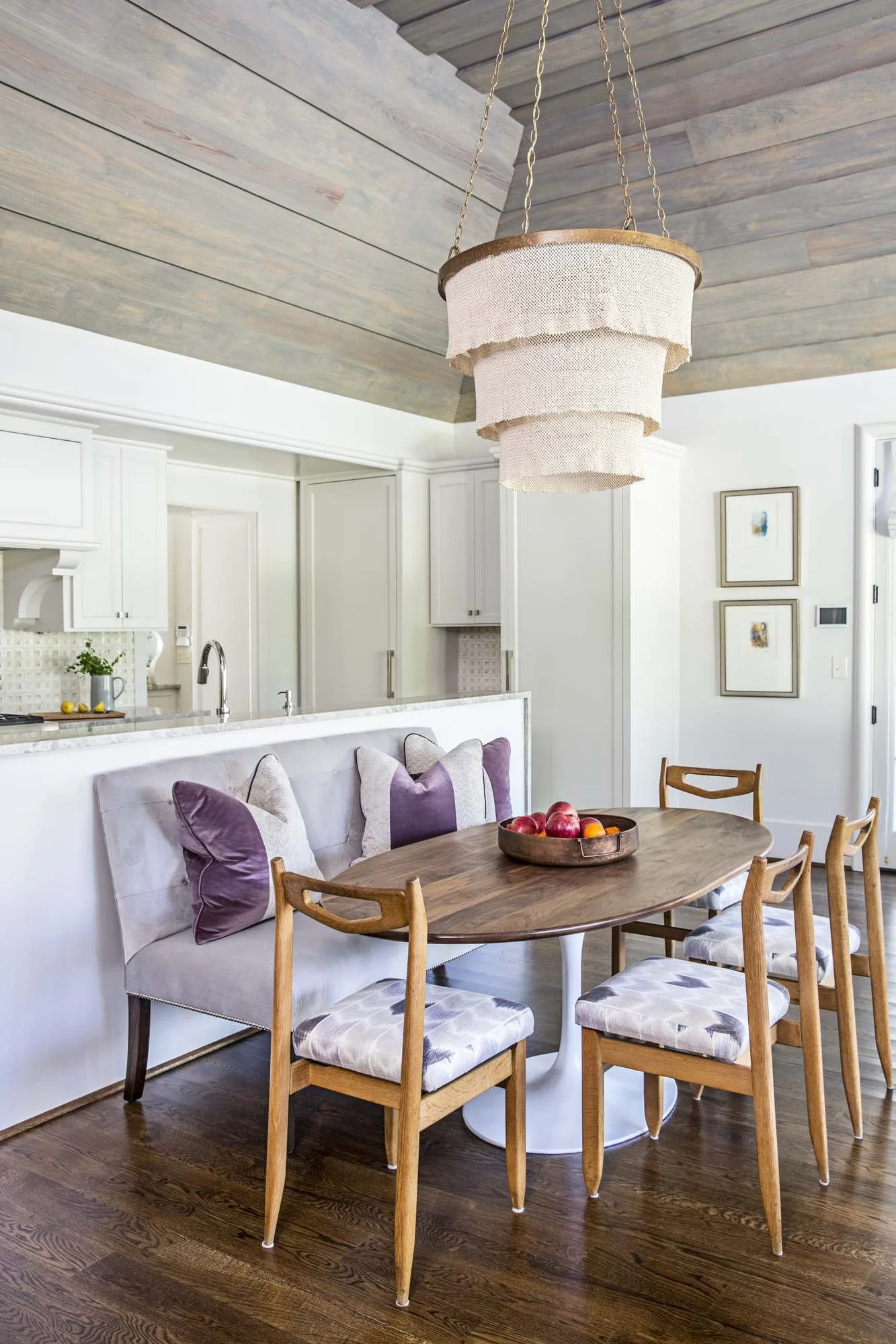 open-kitchen-dining-nook-statement-chandelier-wood-ceiling.jpg