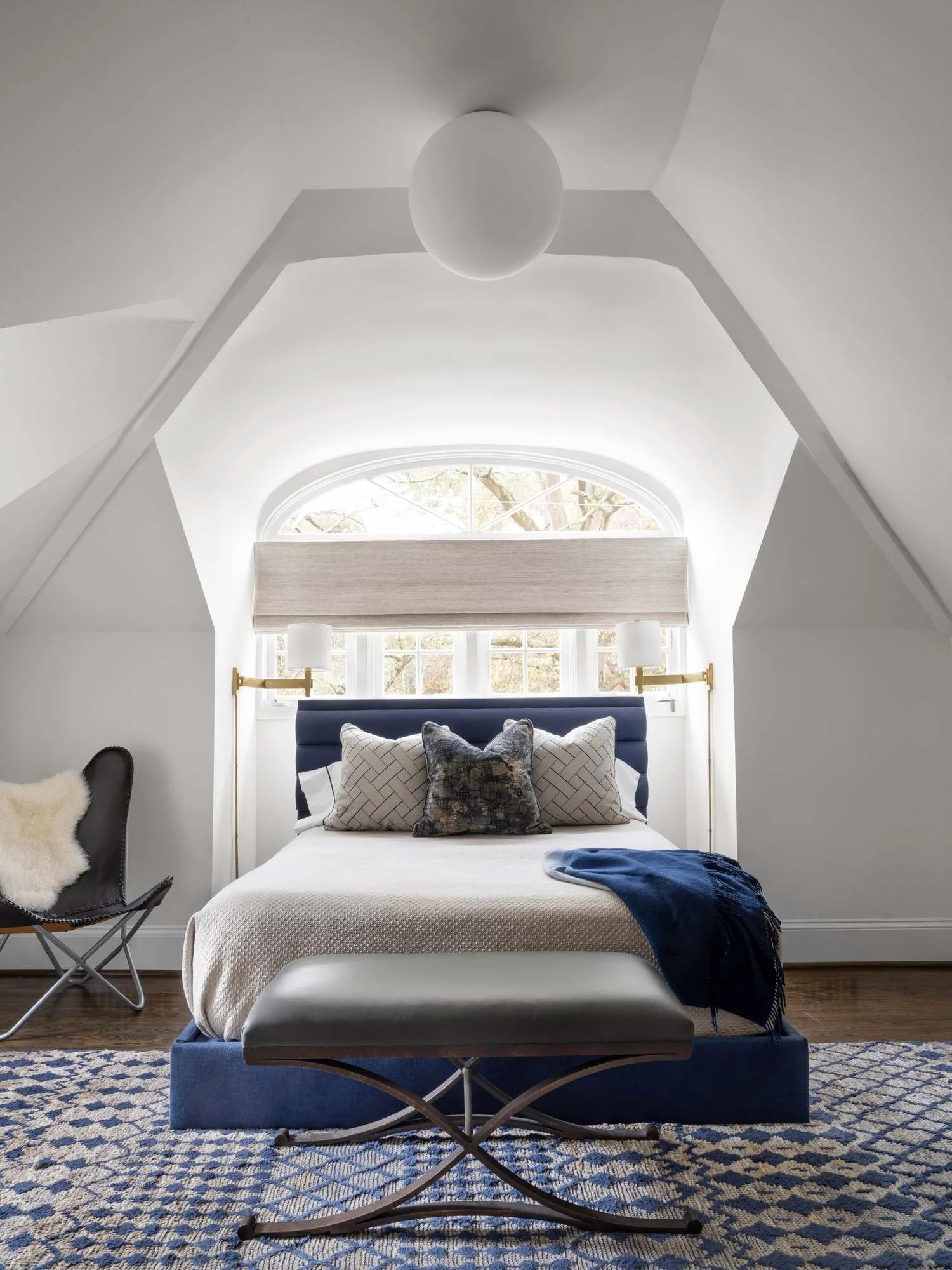 Peachtree-Battle-bedroom-navy-sleigh-bed-arched-dormer-window.jpg