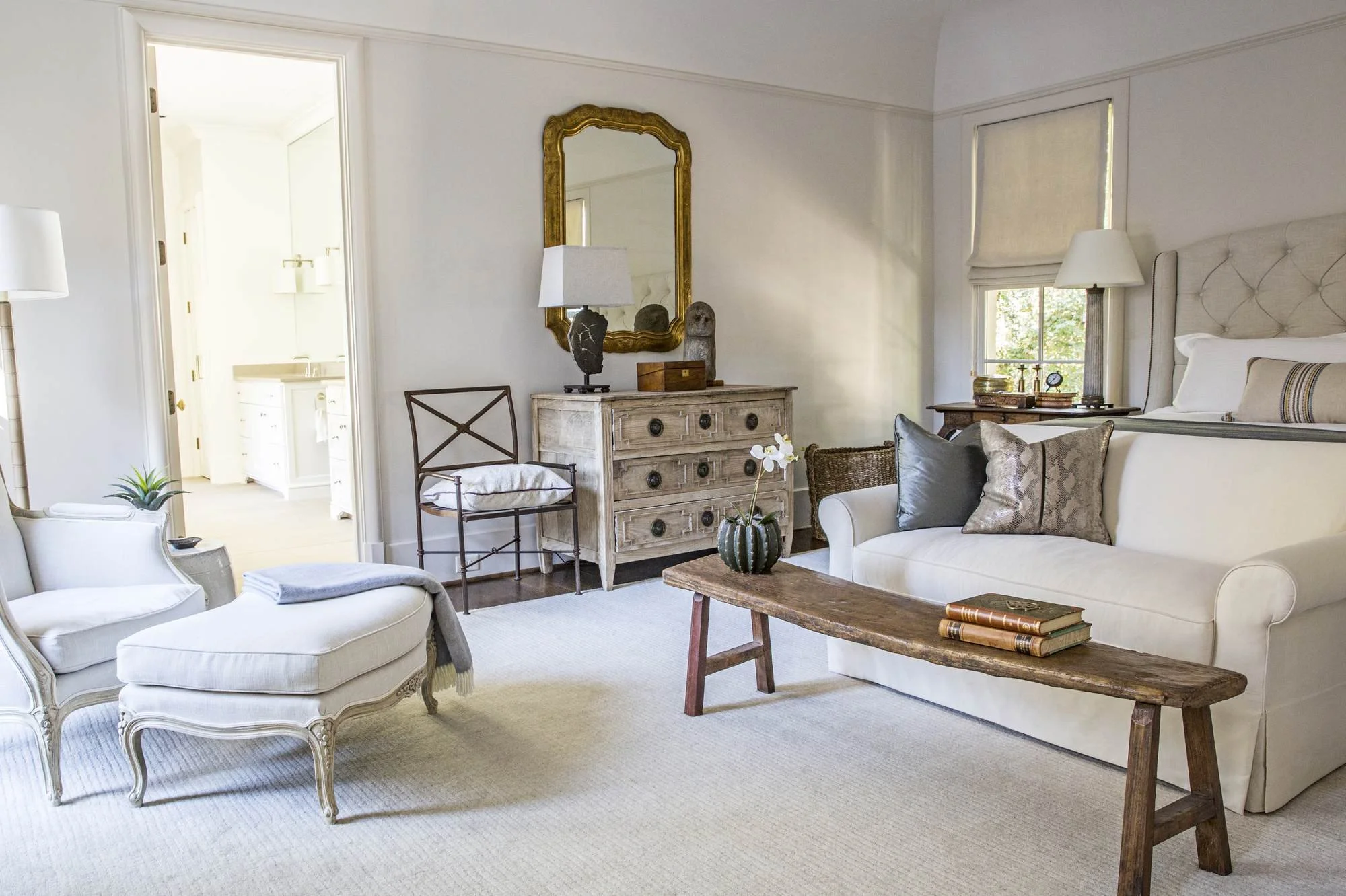atlanta-primary-bedroom-tufted-headboard-antique-dresser.jpg
