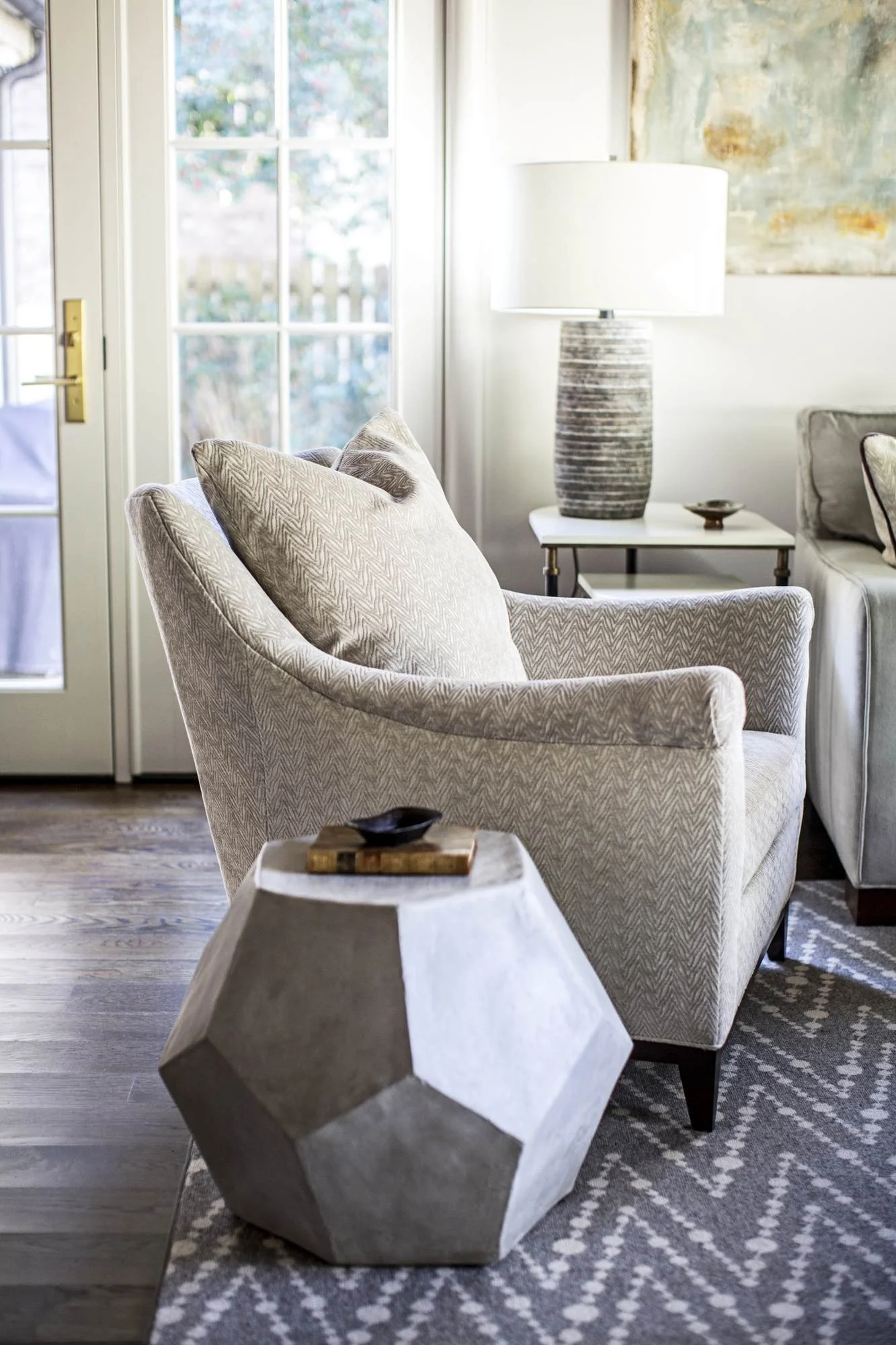 herringbone-accent-chair-geometric-side-table-living-room.jpg
