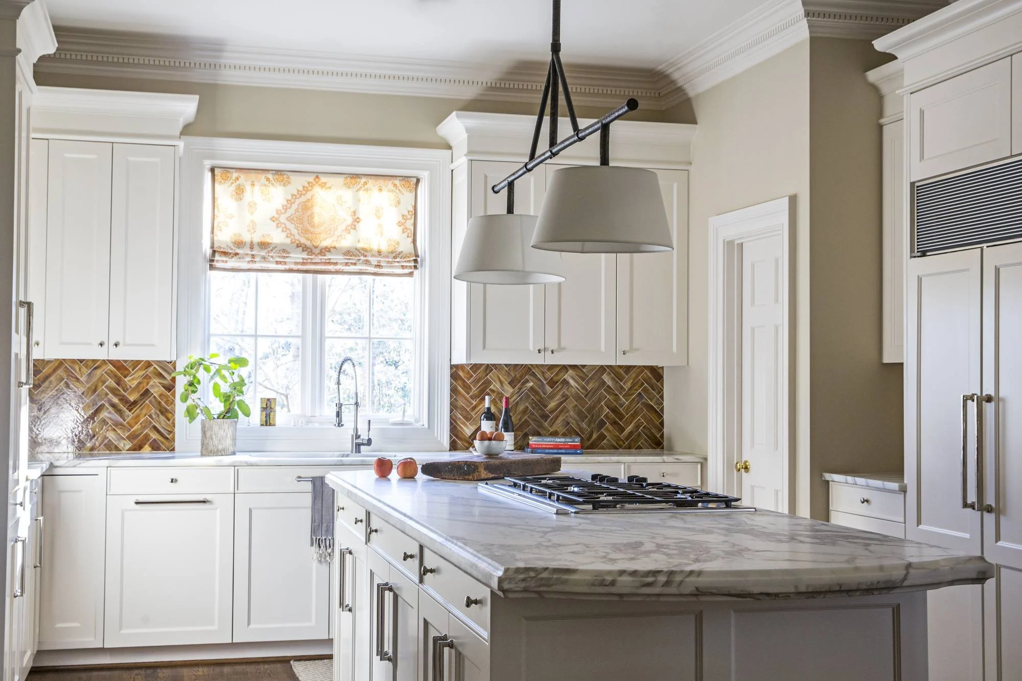cofield-atlanta-residential-interior-design-kitchen-white-cabinets-herringbone-tile-marble-island.jpg