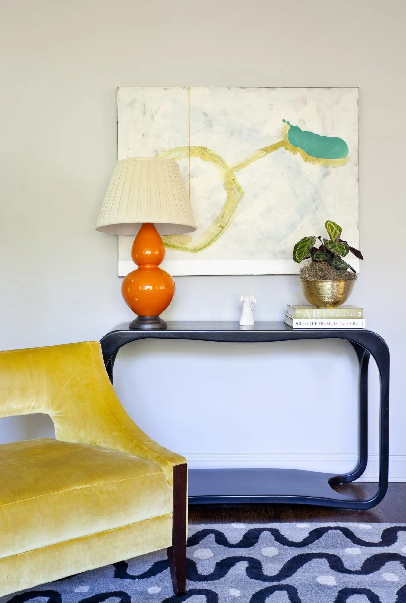 hanover-atlanta-residential-interior-design-den-yellow-velvet-chair-console-abstract-art.jpg